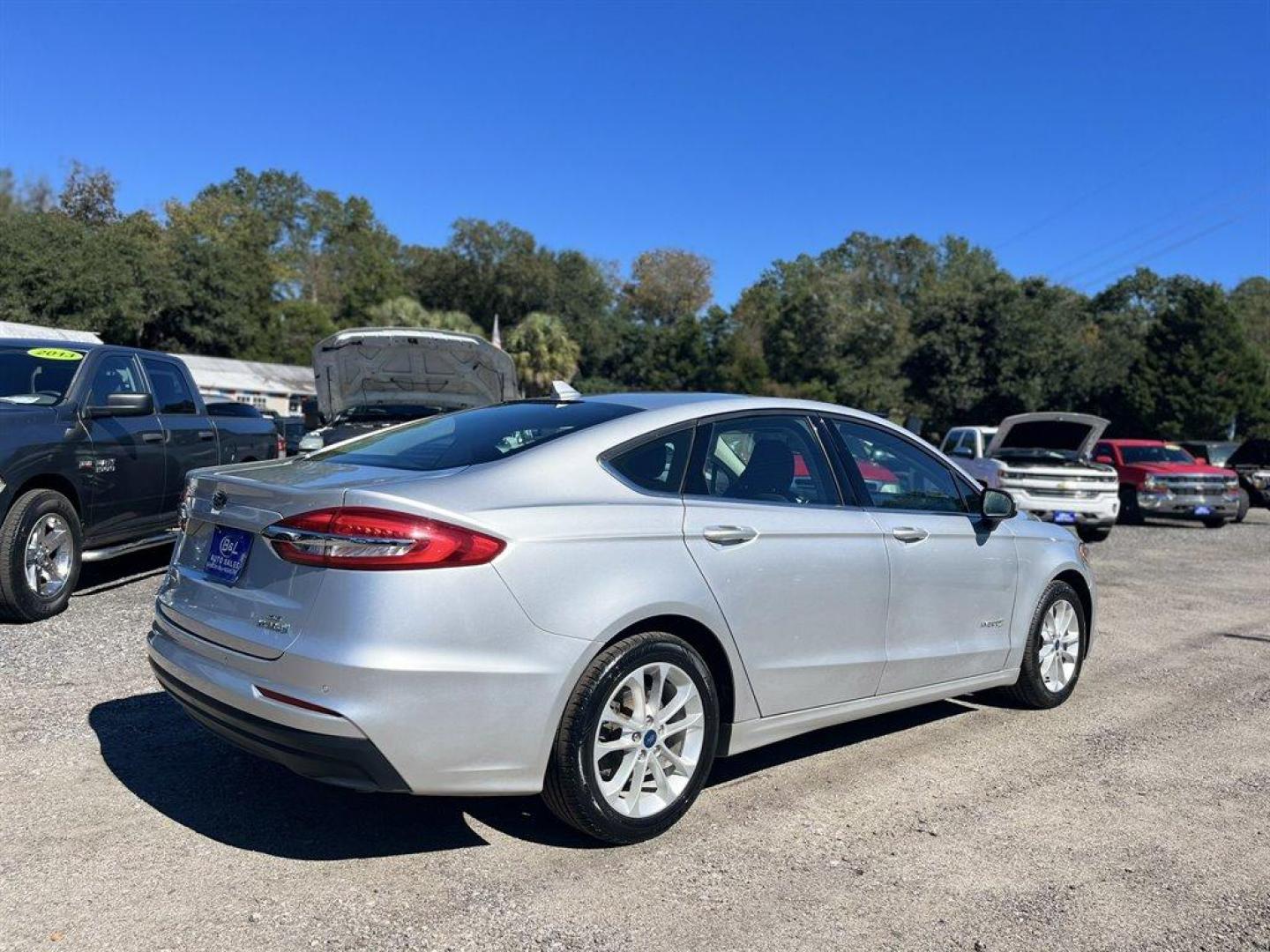 2019 Silver /Black Ford Fusion (3FA6P0LU7KR) with an 2.0l I-4 Smpi Dohc Hybrid engine, Automatic transmission, located at 745 East Steele Rd., West Columbia, SC, 29170, (803) 755-9148, 33.927212, -81.148483 - Special Internet Price! 2019 FORD FUSION - - Photo#2