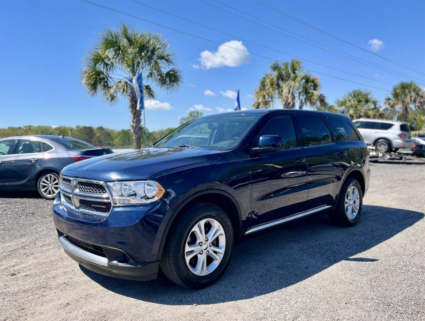 2013 Blue /Grey Dodge Durango (1C4RDJAG0DC) with an 3.6l V6 MPI Dohc 3.6l engine, Automatic transmission, located at 745 East Steele Rd., West Columbia, SC, 29170, (803) 755-9148, 33.927212, -81.148483 - Special Internet Price! 2013 Dodge Durango SXT with AM/FM stereo, Backup camera, Remote keyless entry, 3-zone auto temp control, Cloth interior, 3rd row bench seat, Powered windows, Powered door locks, Plus more! - Photo#0