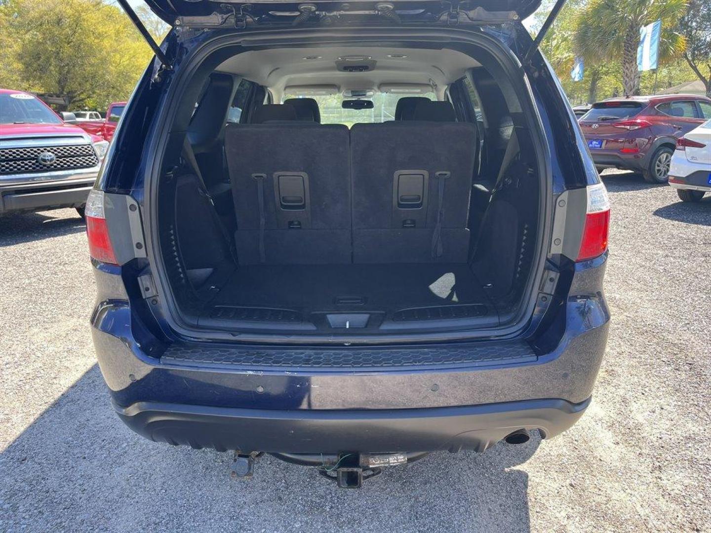 2013 Blue /Grey Dodge Durango (1C4RDJAG0DC) with an 3.6l V6 MPI Dohc 3.6l engine, Automatic transmission, located at 745 East Steele Rd., West Columbia, SC, 29170, (803) 755-9148, 33.927212, -81.148483 - Special Internet Price! 2013 Dodge Durango SXT with AM/FM stereo, Backup camera, Remote keyless entry, 3-zone auto temp control, Cloth interior, 3rd row bench seat, Powered windows, Powered door locks, Plus more! - Photo#28