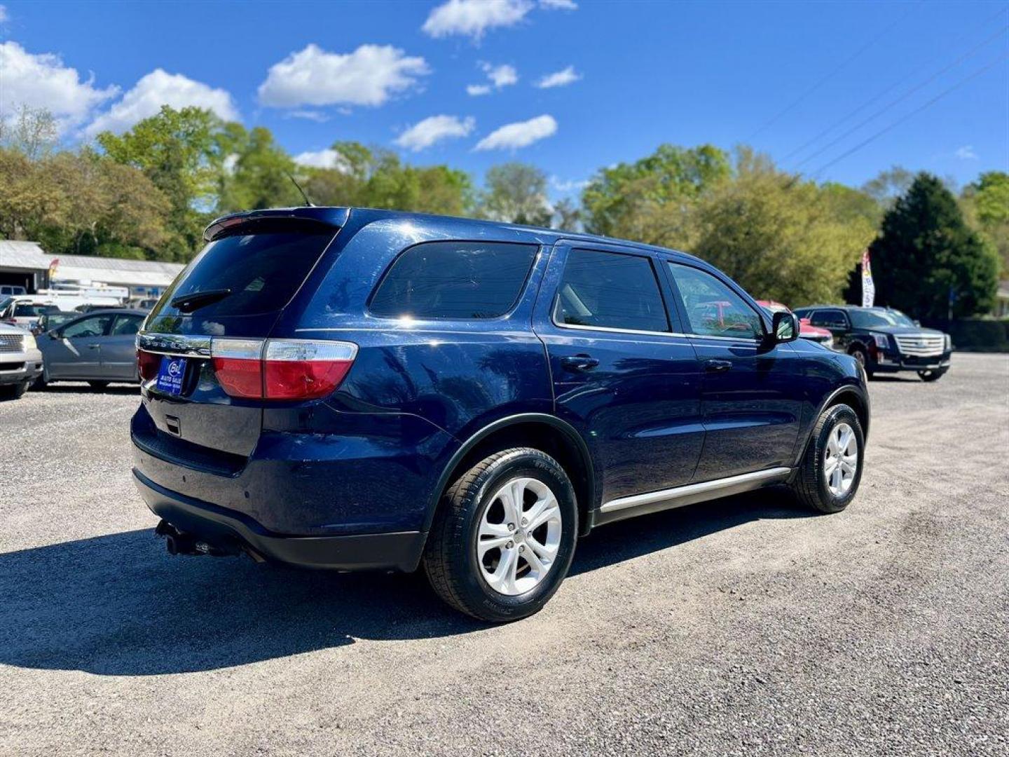 2013 Blue /Grey Dodge Durango (1C4RDJAG0DC) with an 3.6l V6 MPI Dohc 3.6l engine, Automatic transmission, located at 745 East Steele Rd., West Columbia, SC, 29170, (803) 755-9148, 33.927212, -81.148483 - Special Internet Price! 2013 Dodge Durango SXT with AM/FM stereo, Backup camera, Remote keyless entry, 3-zone auto temp control, Cloth interior, 3rd row bench seat, Powered windows, Powered door locks, Plus more! - Photo#2