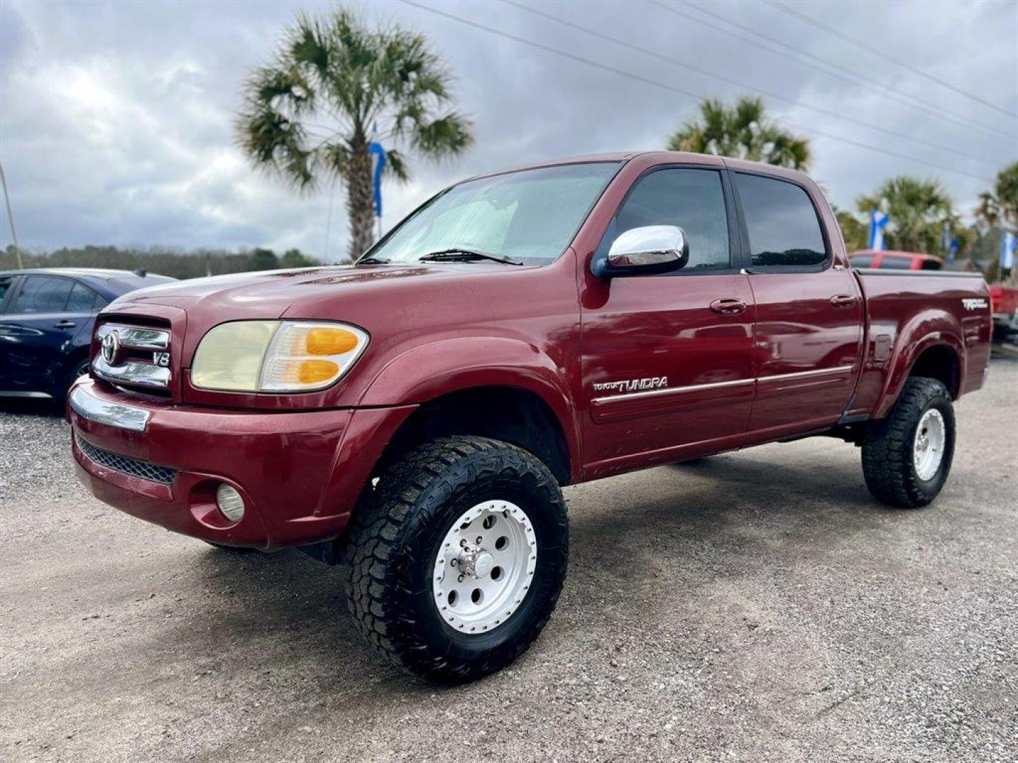 2004 Burgandy /Tan Toyota Tundra (5TBET34184S) with an 4.7l V8 EFI Dohc 4.7l engine, Automatic transmission, located at 745 East Steele Rd., West Columbia, SC, 29170, (803) 755-9148, 33.927212, -81.148483 - Special Internet Price! 2004 Toyota Tundra with AM/FM radio, Sunroof, Cruise control, Air conditioning, Leather interior, 60/40 split/fold/tumble rear bench seat, Powered windows, Powered door locks, Plus more! - Photo#0