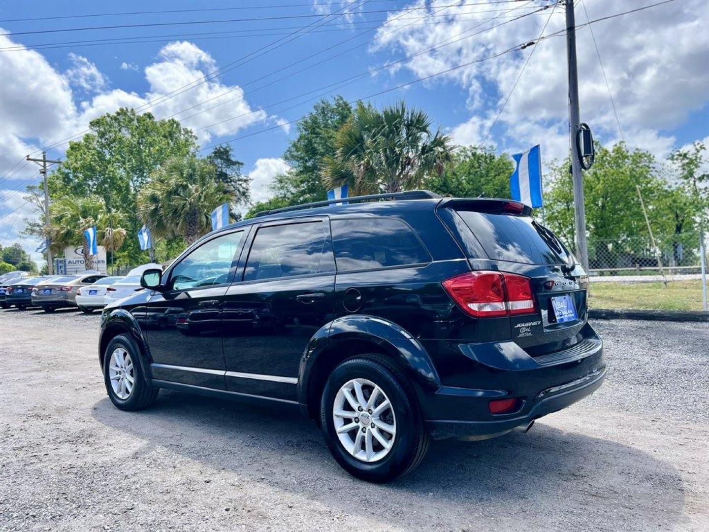 2017 Black /Black Dodge Journey (3C4PDCBG4HT) with an 3.6l V6 MPI Dohc VVT Flex engine, Automatic transmission, located at 745 East Steele Rd., West Columbia, SC, 29170, (803) 755-9148, 33.927212, -81.148483 - Special Internet Price! 2017 Dodge Journey SXT with Bluetooth, AM/FM/Satellite, Cruise Control, Push to start, Keyless entry, Dual zone manual air conditioning, Front bucket seats, 3rd row seating, Powered windows, Powered door locks, Plus more! - Photo#1