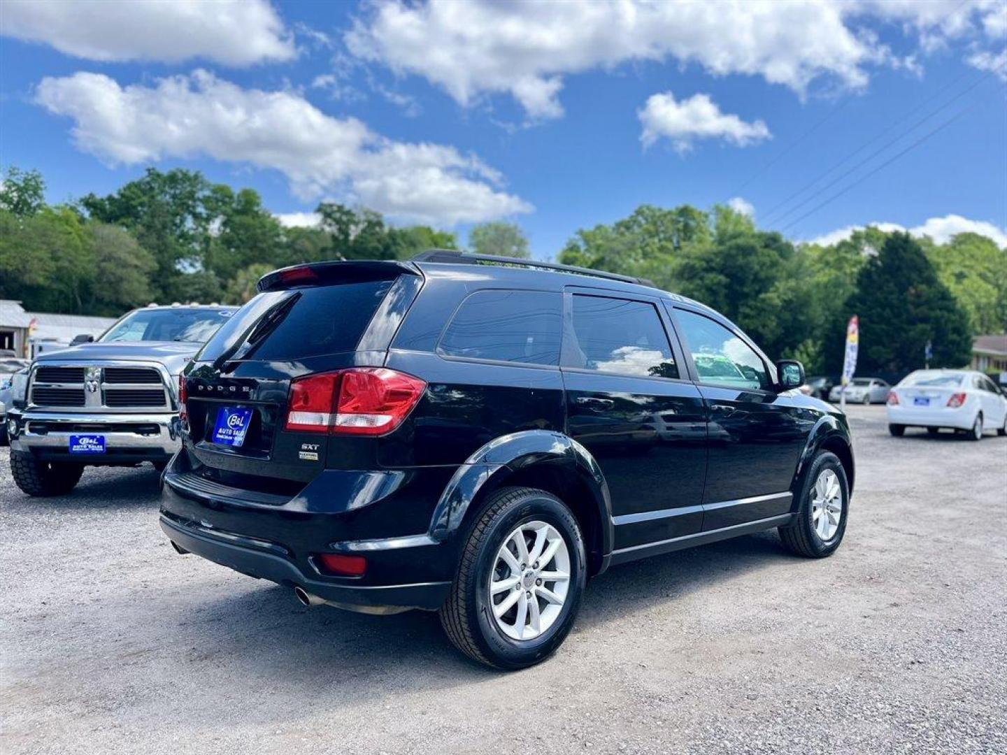 2017 Black /Black Dodge Journey (3C4PDCBG4HT) with an 3.6l V6 MPI Dohc VVT Flex engine, Automatic transmission, located at 745 East Steele Rd., West Columbia, SC, 29170, (803) 755-9148, 33.927212, -81.148483 - Special Internet Price! 2017 Dodge Journey SXT with Bluetooth, AM/FM/Satellite, Cruise Control, Push to start, Keyless entry, Dual zone manual air conditioning, Front bucket seats, 3rd row seating, Powered windows, Powered door locks, Plus more! - Photo#2