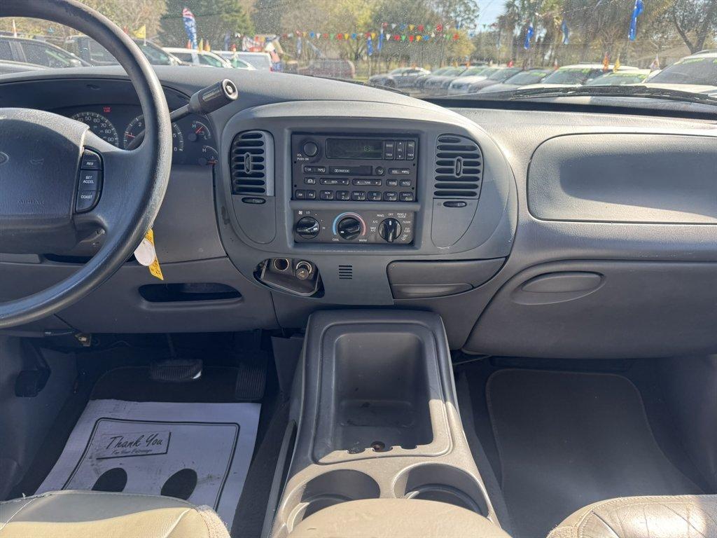 1999 Blue /Grey Ford Expedition (1FMRU1769XL) with an 4.6l V8 EFI Sohc 4.6l engine, Auto transmission, located at 745 East Steele Rd., West Columbia, SC, 29170, (803) 755-9148, 33.927212, -81.148483 - Photo#10