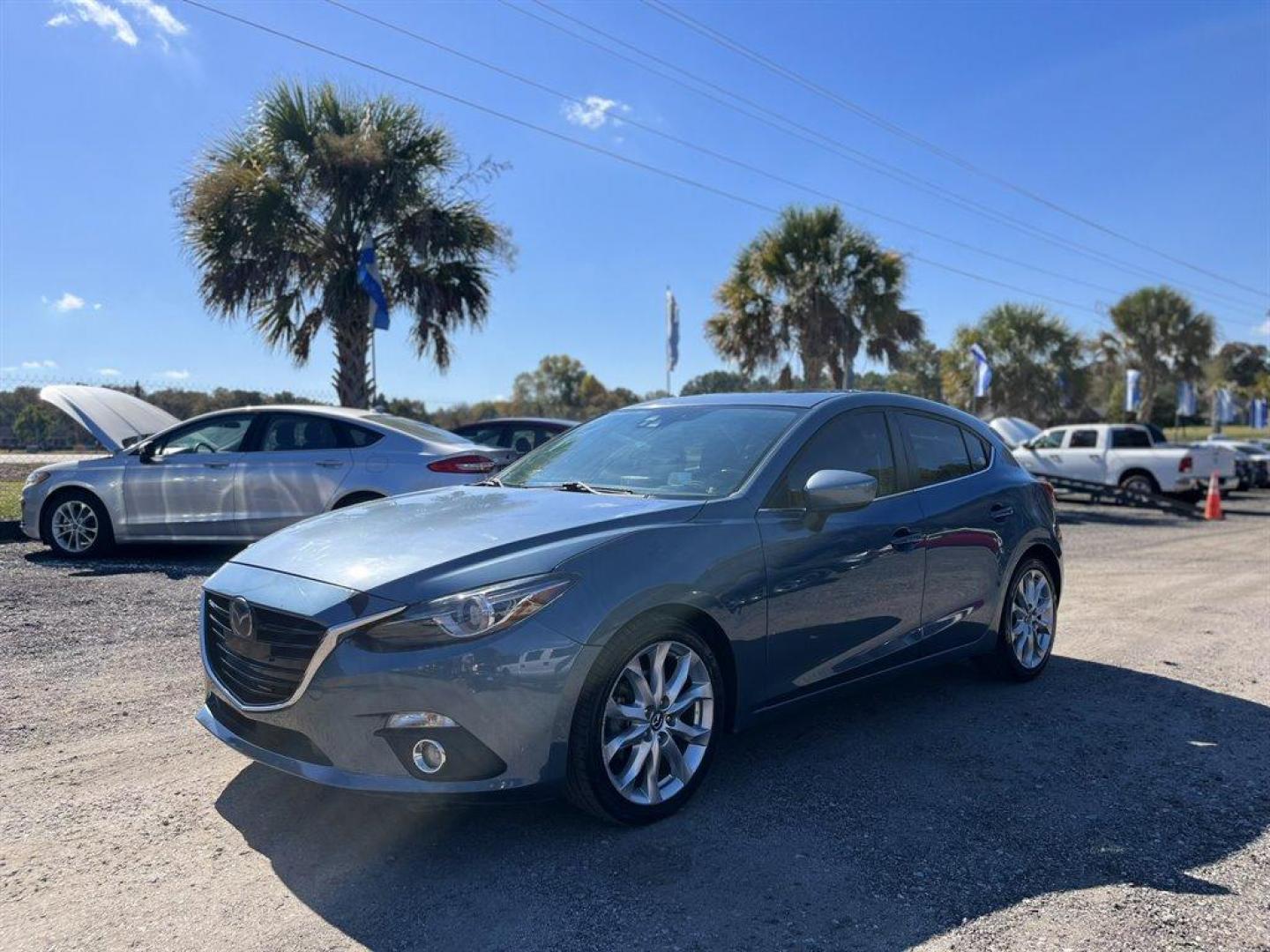 2014 Blue /Black Mazda Mazda3 (JM1BM1M31E1) with an 2.5l I-4 DI Dohc 2.5l engine, Automatic transmission, located at 745 East Steele Rd., West Columbia, SC, 29170, (803) 755-9148, 33.927212, -81.148483 - Special Internet Price! 2014 Mazda Mazda3 with Bluetooth, Backup camera, Navigation, Headsup display, Leather interior, Cruise control, Dual Zone Front Automatic Air Conditioning, Remote Keyless Entry, Powered windows, Powered door locks, Plus more! - Photo#0