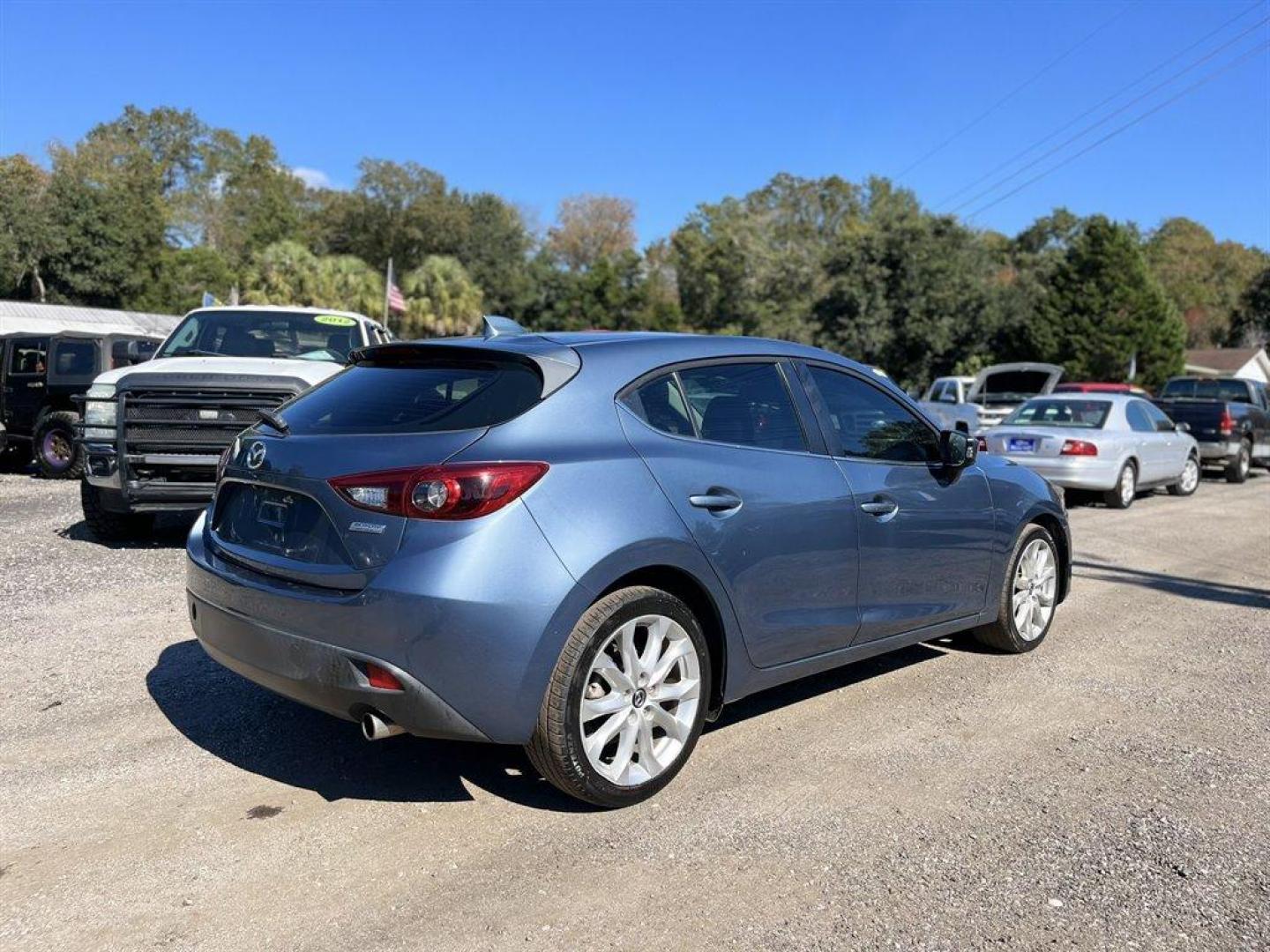 2014 Blue /Black Mazda Mazda3 (JM1BM1M31E1) with an 2.5l I-4 DI Dohc 2.5l engine, Automatic transmission, located at 745 East Steele Rd., West Columbia, SC, 29170, (803) 755-9148, 33.927212, -81.148483 - Special Internet Price! 2014 Mazda Mazda3 with Bluetooth, Backup camera, Navigation, Headsup display, Leather interior, Cruise control, Dual Zone Front Automatic Air Conditioning, Remote Keyless Entry, Powered windows, Powered door locks, Plus more! - Photo#2