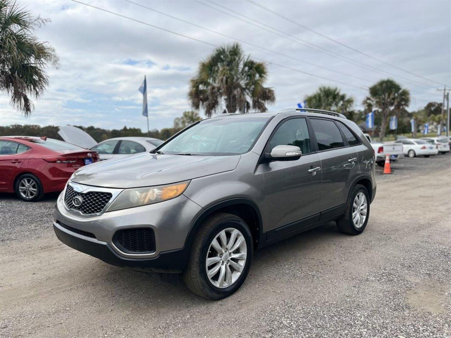 2011 Grey /Grey Kia Sorento (5XYKT4A23BG) with an 3.5l V6 MPI Dohc Cvvt 3.5 engine, Automatic transmission, located at 745 East Steele Rd., West Columbia, SC, 29170, (803) 755-9148, 33.927212, -81.148483 - Special Internet Price! 2011 Kia Sorento with AM/FM stereo, Bluetooth, AUX port, Cruise control, Air conditioning, Tricot cloth front bucket seats, 3rd row seating, Powered windows, Powered door locks, Plus more! - Photo#0