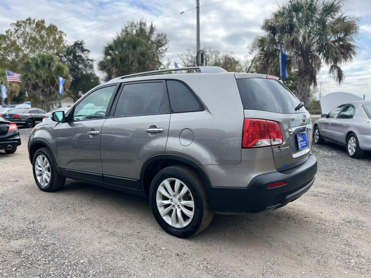 2011 Grey /Grey Kia Sorento (5XYKT4A23BG) with an 3.5l V6 MPI Dohc Cvvt 3.5 engine, Automatic transmission, located at 745 East Steele Rd., West Columbia, SC, 29170, (803) 755-9148, 33.927212, -81.148483 - Special Internet Price! 2011 Kia Sorento with AM/FM stereo, Bluetooth, AUX port, Cruise control, Air conditioning, Tricot cloth front bucket seats, 3rd row seating, Powered windows, Powered door locks, Plus more! - Photo#1