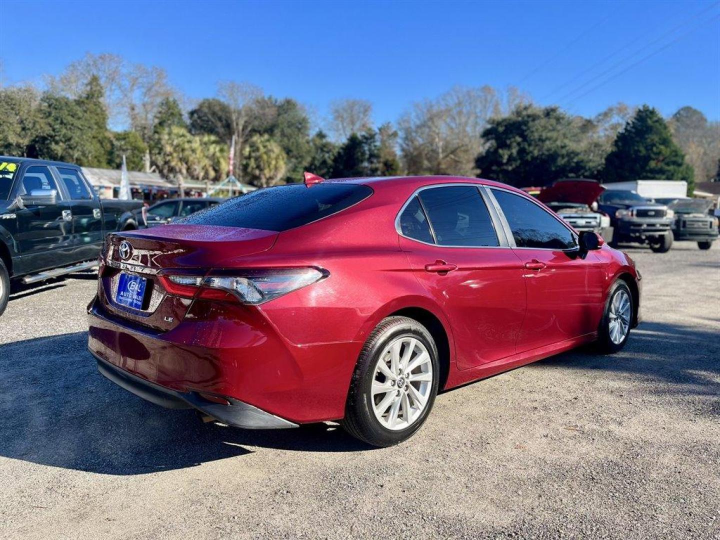 2021 Burgundy /Black Toyota Camry (4T1C11AK0MU) with an 2.5l I-4 DI Dohc 2.5l engine, Automatic transmission, located at 745 East Steele Rd., West Columbia, SC, 29170, (803) 755-9148, 33.927212, -81.148483 - Special Internet Price! 2021 Toyota Camry LE with Bluetooth, 7 touch-screen, SiriusXM 3-month All Access trial, Cruise control, Backup camera, Remote Keyless Entry, Manual Air Conditioning, Cloth interior, Powered driver seat, Rear 60-40 Folding Bench, Powered windows, Powered door locks, Plus more - Photo#2