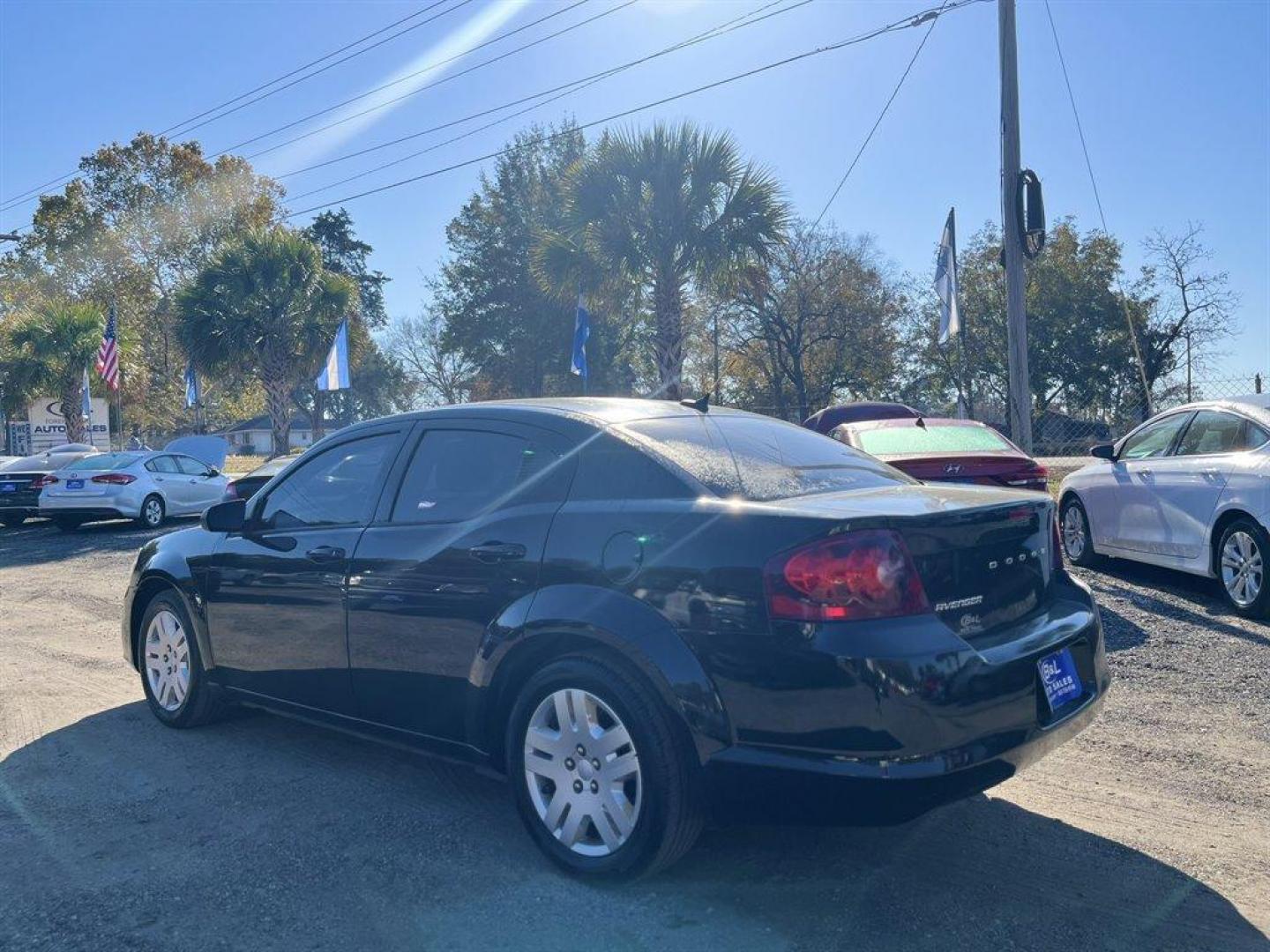 2014 Black /Black Dodge Avenger (1C3CDZAB7EN) with an 2.4l I-4 SFI Dohc 2.4l engine, Automatic transmission, located at 745 East Steele Rd., West Columbia, SC, 29170, (803) 755-9148, 33.927212, -81.148483 - 2014 Dodge Avenger with Bluetooth, AM/FM radio, Cruise control, Black cloth interior, Rear 60-40 Folding Bench, Remote Keyless Entry, Powered windows, Powered door locks, Plus more! - Photo#1