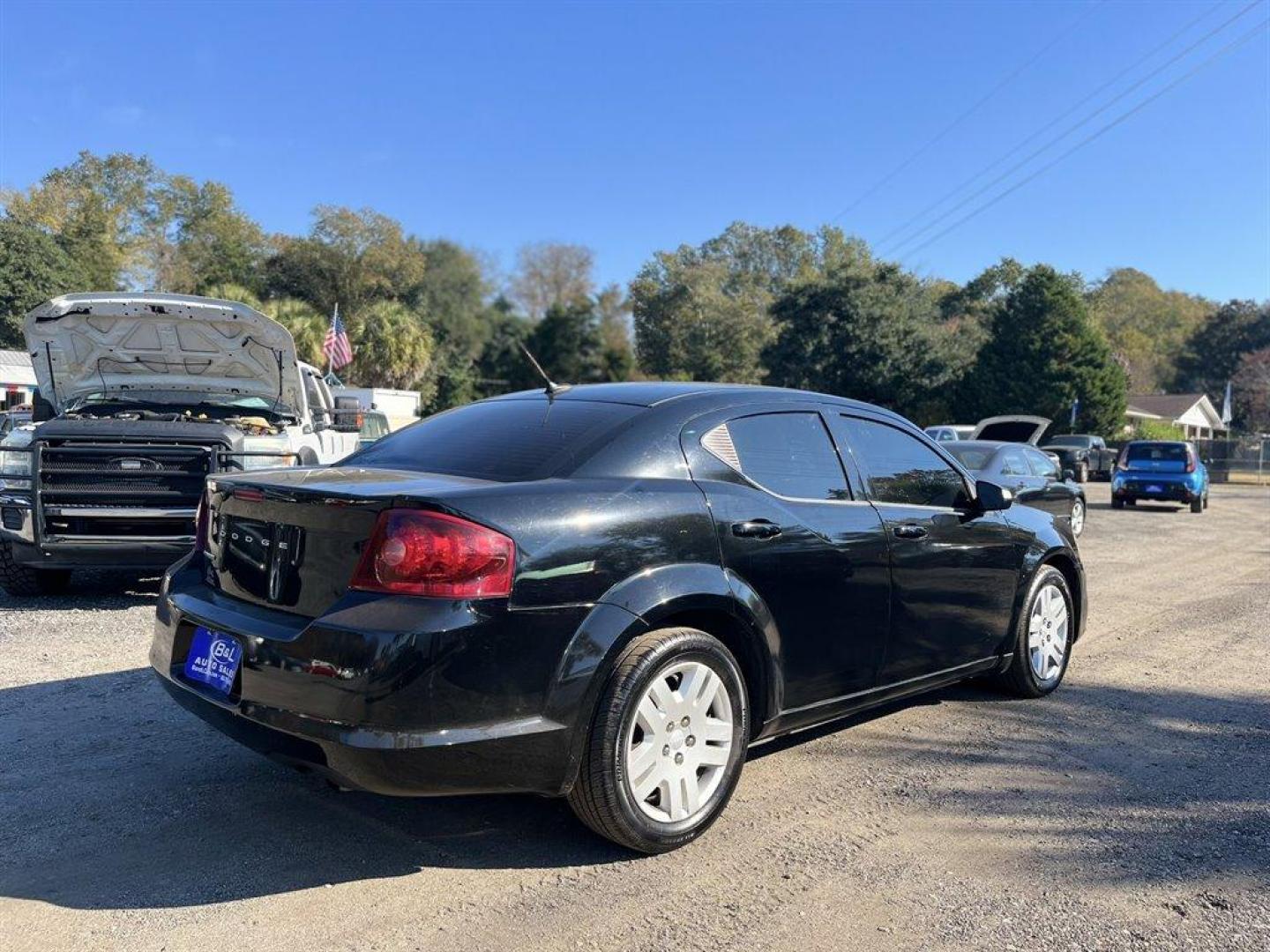 2014 Black /Black Dodge Avenger (1C3CDZAB7EN) with an 2.4l I-4 SFI Dohc 2.4l engine, Automatic transmission, located at 745 East Steele Rd., West Columbia, SC, 29170, (803) 755-9148, 33.927212, -81.148483 - 2014 Dodge Avenger with Bluetooth, AM/FM radio, Cruise control, Black cloth interior, Rear 60-40 Folding Bench, Remote Keyless Entry, Powered windows, Powered door locks, Plus more! - Photo#2