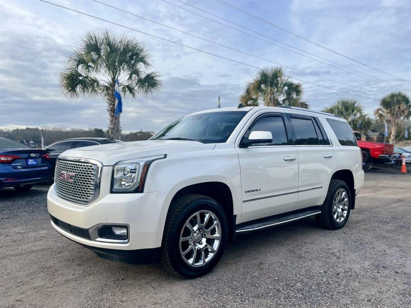 2015 White /Tan GMC Yukon (1GKS2CKJ1FR) with an 6.2l V8 DI OHV VVT S/C 6. engine, Automatic transmission, located at 745 East Steele Rd., West Columbia, SC, 29170, (803) 755-9148, 33.927212, -81.148483 - Special Internet Price! 2015 GMC Yukon Denali with Bluetooth, SiriusXM, 8 Diagonal Color Touch Screen, Backup Camera, Navigation, Cruise Control, Sunroof, Remote Keyless Entry, Rear Entertainment, Leather Interior, Powered Front Seats, Heated Front Seats, Power Fold 3rd Row Split Bench Seat, Powered - Photo#0