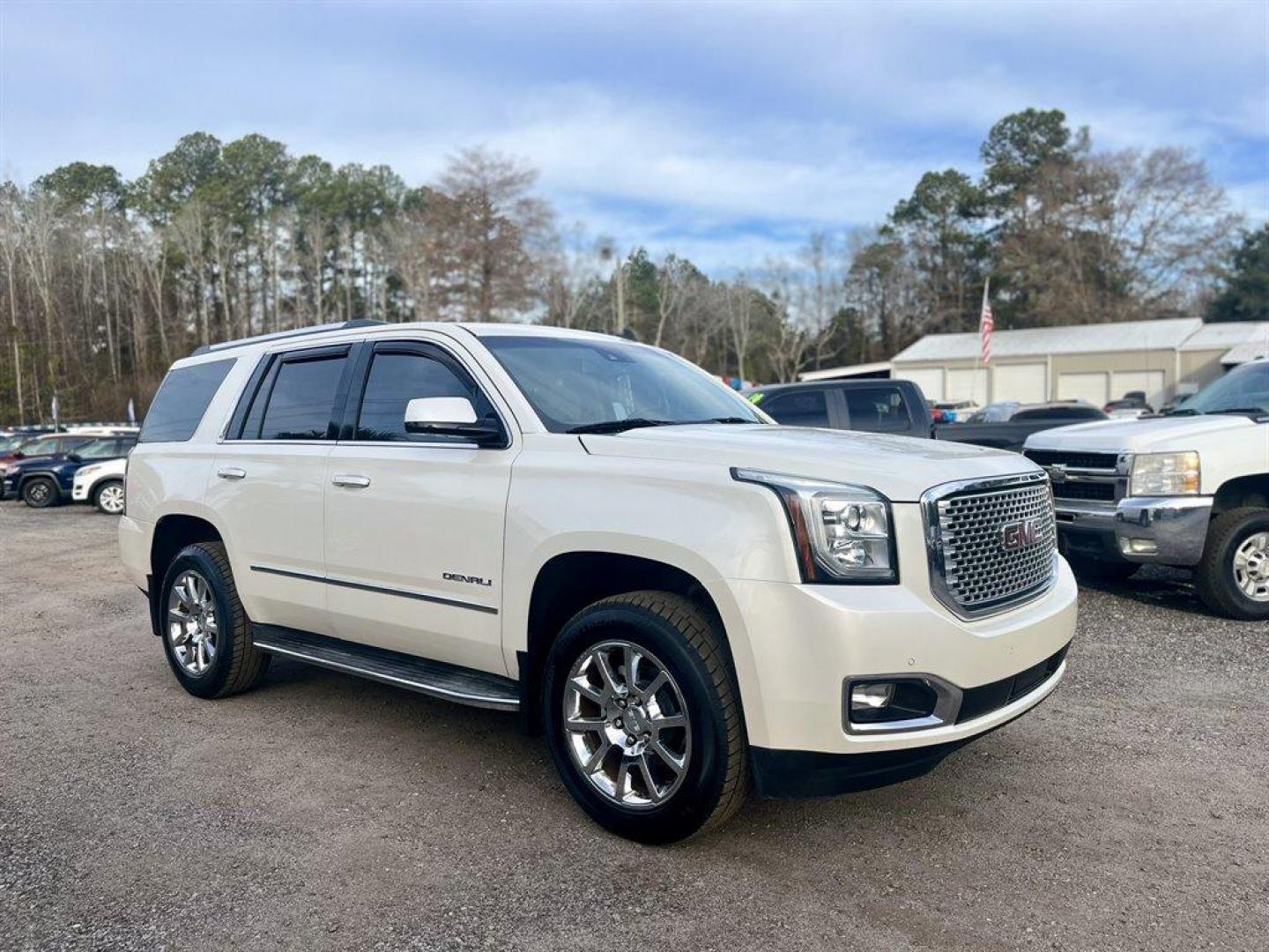 2015 White /Tan GMC Yukon (1GKS2CKJ1FR) with an 6.2l V8 DI OHV VVT S/C 6. engine, Automatic transmission, located at 745 East Steele Rd., West Columbia, SC, 29170, (803) 755-9148, 33.927212, -81.148483 - Special Internet Price! 2015 GMC Yukon Denali with Bluetooth, SiriusXM, 8 Diagonal Color Touch Screen, Backup Camera, Navigation, Cruise Control, Sunroof, Remote Keyless Entry, Rear Entertainment, Leather Interior, Powered Front Seats, Heated Front Seats, Power Fold 3rd Row Split Bench Seat, Powered - Photo#3