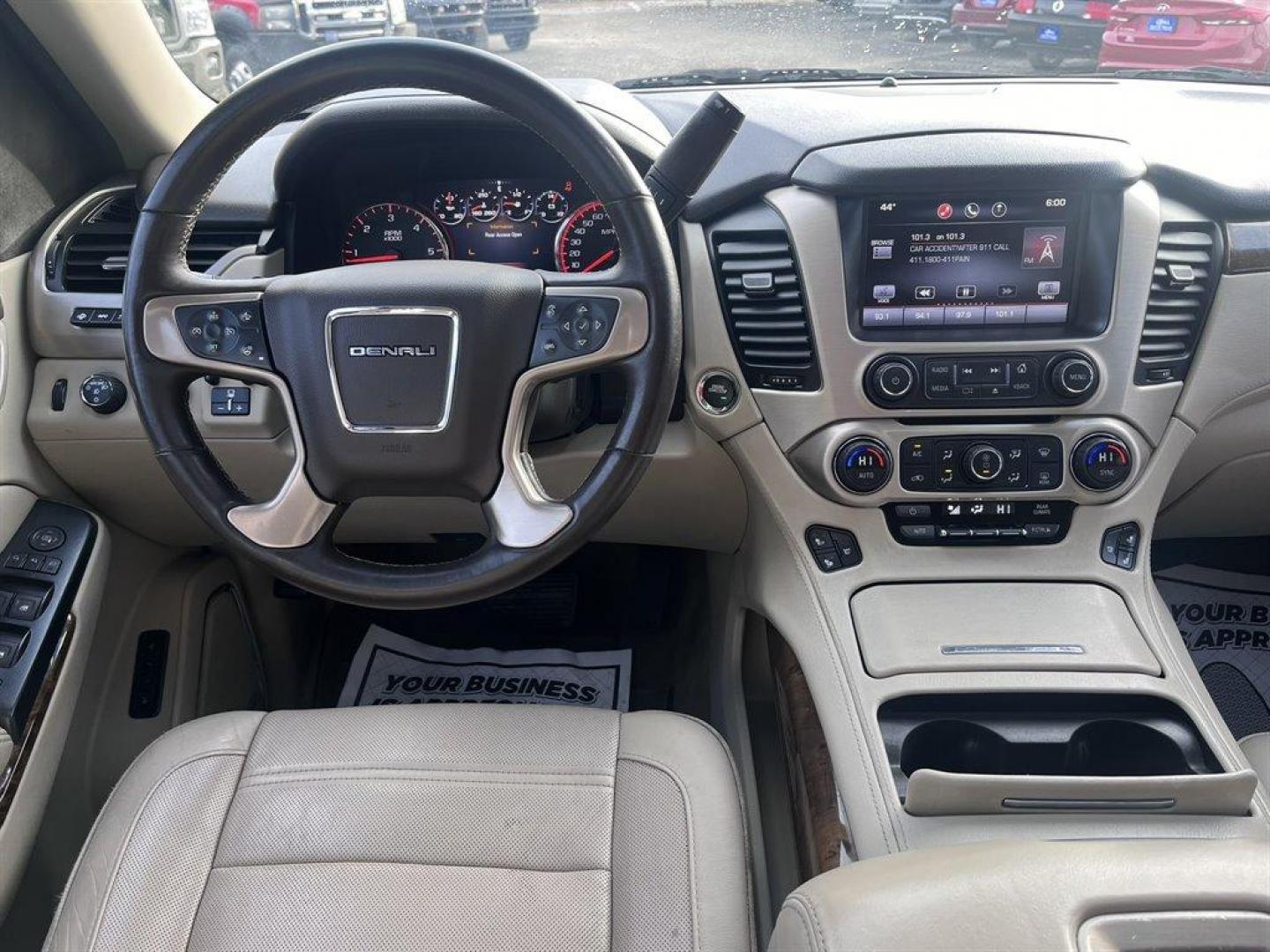 2015 White /Tan GMC Yukon (1GKS2CKJ1FR) with an 6.2l V8 DI OHV VVT S/C 6. engine, Automatic transmission, located at 745 East Steele Rd., West Columbia, SC, 29170, (803) 755-9148, 33.927212, -81.148483 - Special Internet Price! 2015 GMC Yukon Denali with Bluetooth, SiriusXM, 8 Diagonal Color Touch Screen, Backup Camera, Navigation, Cruise Control, Sunroof, Remote Keyless Entry, Rear Entertainment, Leather Interior, Powered Front Seats, Heated Front Seats, Power Fold 3rd Row Split Bench Seat, Powered - Photo#4