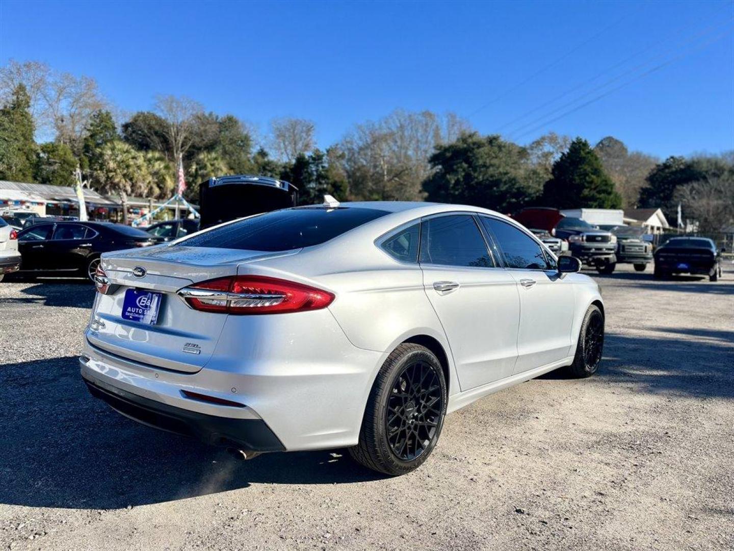 2019 Silver /Black Ford Fusion (3FA6P0CD6KR) with an 1.5l I-4 DI Dohc Ecoboost engine, Automatic transmission, located at 745 East Steele Rd., West Columbia, SC, 29170, (803) 755-9148, 33.927212, -81.148483 - Special Internet Price! 2019 Ford Fusion with Bluetooth, Navigation, Backup Camera, Cruise Control, Sunroof, Remote Keyless Entry, Push To Start, Leather Interior, Heated Front Seats, Powered Front Seats, Rear 60-40 Folding Bench Seat, Powered Door Locks, Powered Windows, Plus More! - Photo#2