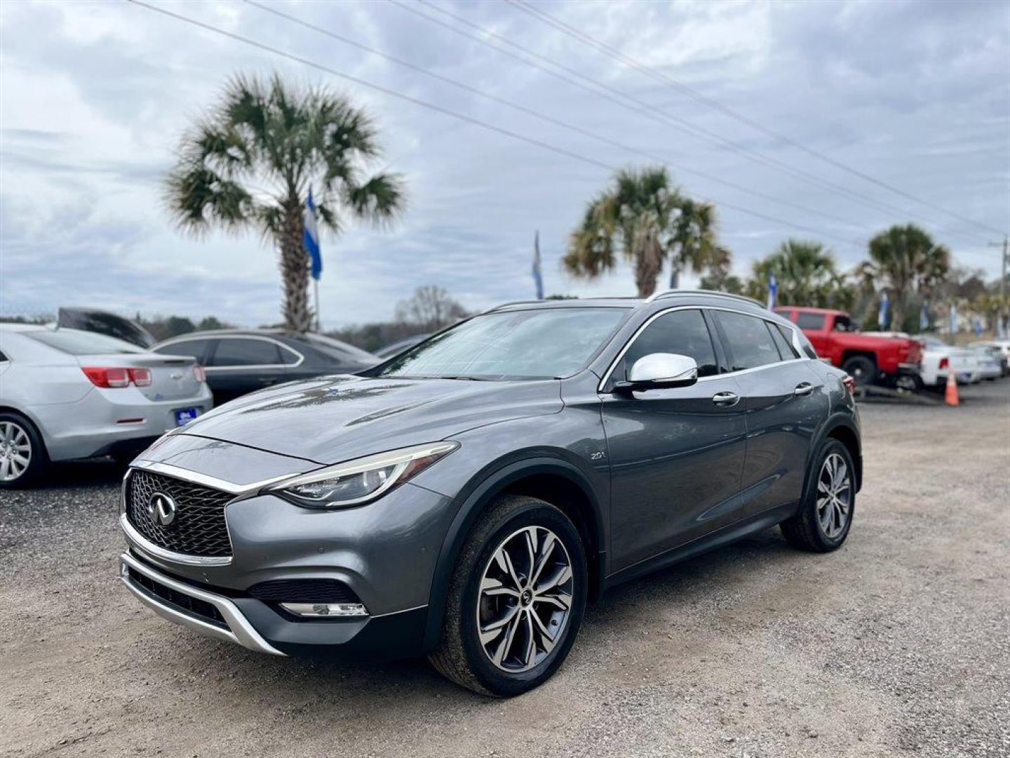 2017 Grey /Brown Infiniti QX30 (SJKCH5CR6HA) with an 2.0l I-4 DI Dohc T/C 2.0l engine, Automatic transmission, located at 745 East Steele Rd., West Columbia, SC, 29170, (803) 755-9148, 33.927212, -81.148483 - Special Internet Price! 2017 Infiniti QX30 with Bluetooth, AM/FM/CD/HD/SAT Audio System, Push Button Start, Remote Keyless Entry, Cruise Control, Dual Zone Front Automatic Air Conditioning, Panoramic Sunroof, Memory Driver Seat Settings, Powered Front Seats, Leather Interior, Rear 60-40 Folding Benc - Photo#0