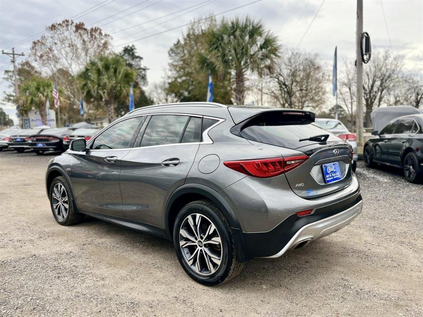 2017 Grey /Brown Infiniti QX30 (SJKCH5CR6HA) with an 2.0l I-4 DI Dohc T/C 2.0l engine, Automatic transmission, located at 745 East Steele Rd., West Columbia, SC, 29170, (803) 755-9148, 33.927212, -81.148483 - Special Internet Price! 2017 Infiniti QX30 with Bluetooth, AM/FM/CD/HD/SAT Audio System, Push Button Start, Remote Keyless Entry, Cruise Control, Dual Zone Front Automatic Air Conditioning, Panoramic Sunroof, Memory Driver Seat Settings, Powered Front Seats, Leather Interior, Rear 60-40 Folding Benc - Photo#1