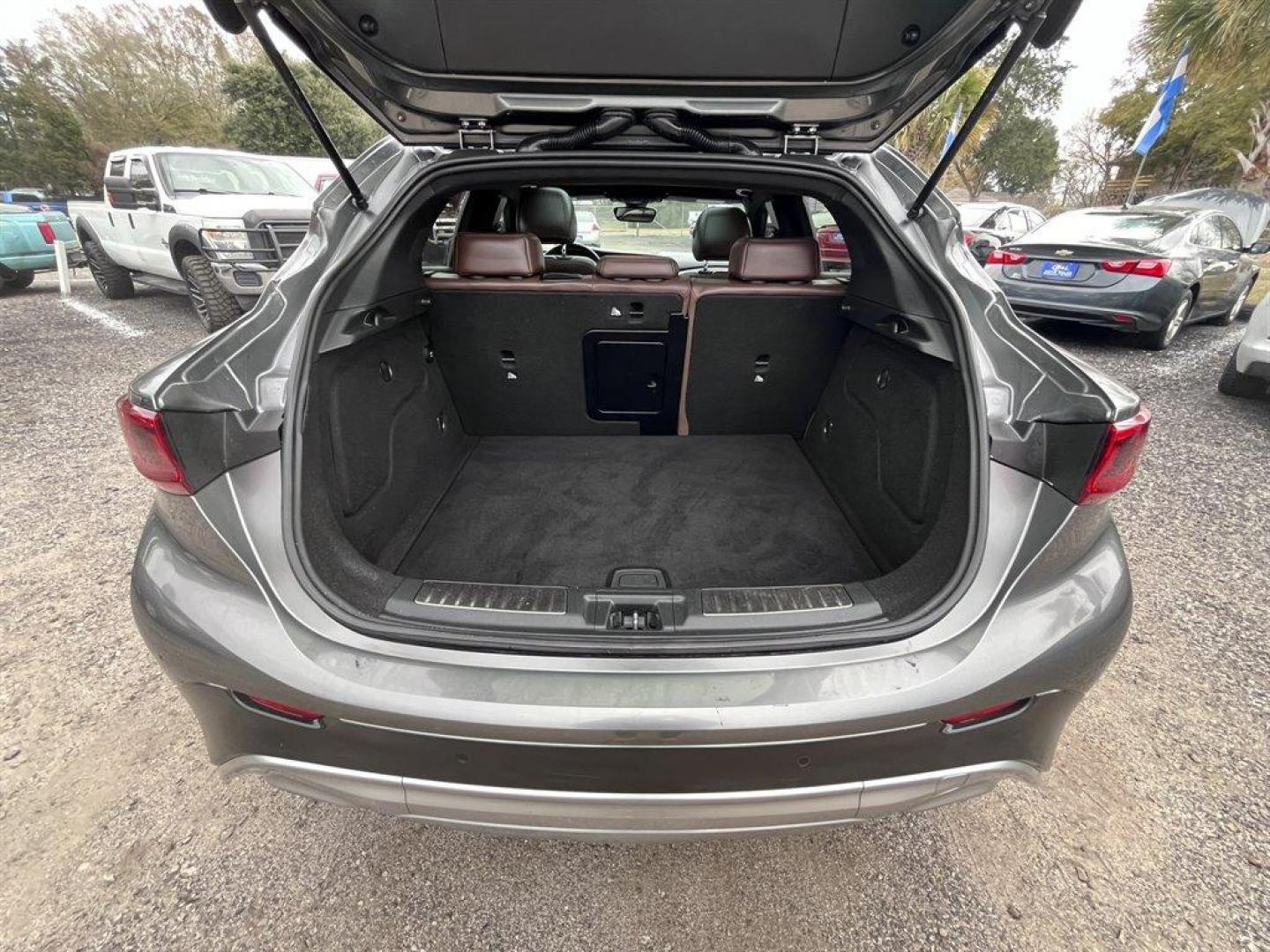 2017 Grey /Brown Infiniti QX30 (SJKCH5CR6HA) with an 2.0l I-4 DI Dohc T/C 2.0l engine, Automatic transmission, located at 745 East Steele Rd., West Columbia, SC, 29170, (803) 755-9148, 33.927212, -81.148483 - Special Internet Price! 2017 Infiniti QX30 with Bluetooth, AM/FM/CD/HD/SAT Audio System, Push Button Start, Remote Keyless Entry, Cruise Control, Dual Zone Front Automatic Air Conditioning, Panoramic Sunroof, Memory Driver Seat Settings, Powered Front Seats, Leather Interior, Rear 60-40 Folding Benc - Photo#33