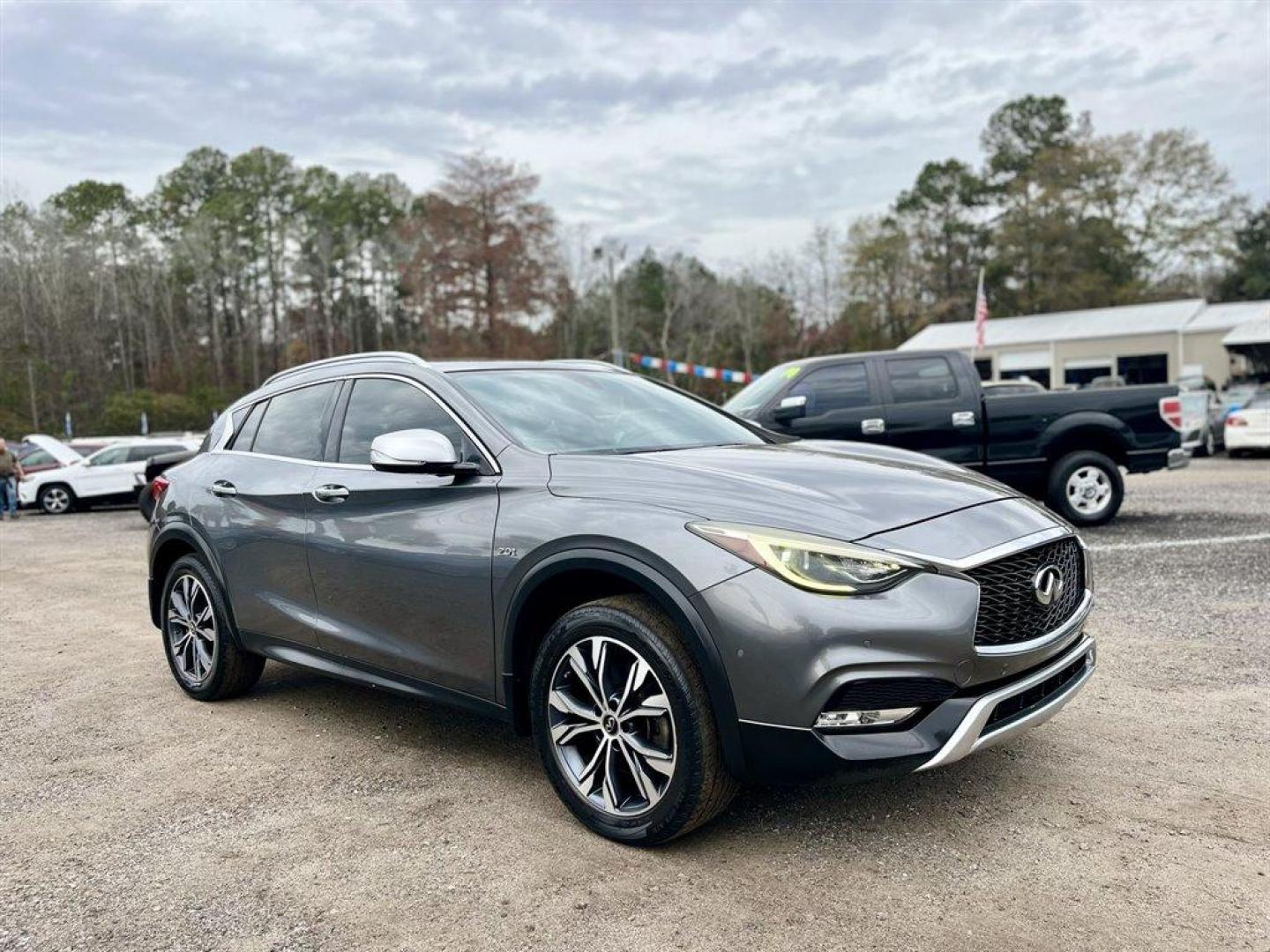 2017 Grey /Brown Infiniti QX30 (SJKCH5CR6HA) with an 2.0l I-4 DI Dohc T/C 2.0l engine, Automatic transmission, located at 745 East Steele Rd., West Columbia, SC, 29170, (803) 755-9148, 33.927212, -81.148483 - Special Internet Price! 2017 Infiniti QX30 with Bluetooth, AM/FM/CD/HD/SAT Audio System, Push Button Start, Remote Keyless Entry, Cruise Control, Dual Zone Front Automatic Air Conditioning, Panoramic Sunroof, Memory Driver Seat Settings, Powered Front Seats, Leather Interior, Rear 60-40 Folding Benc - Photo#3