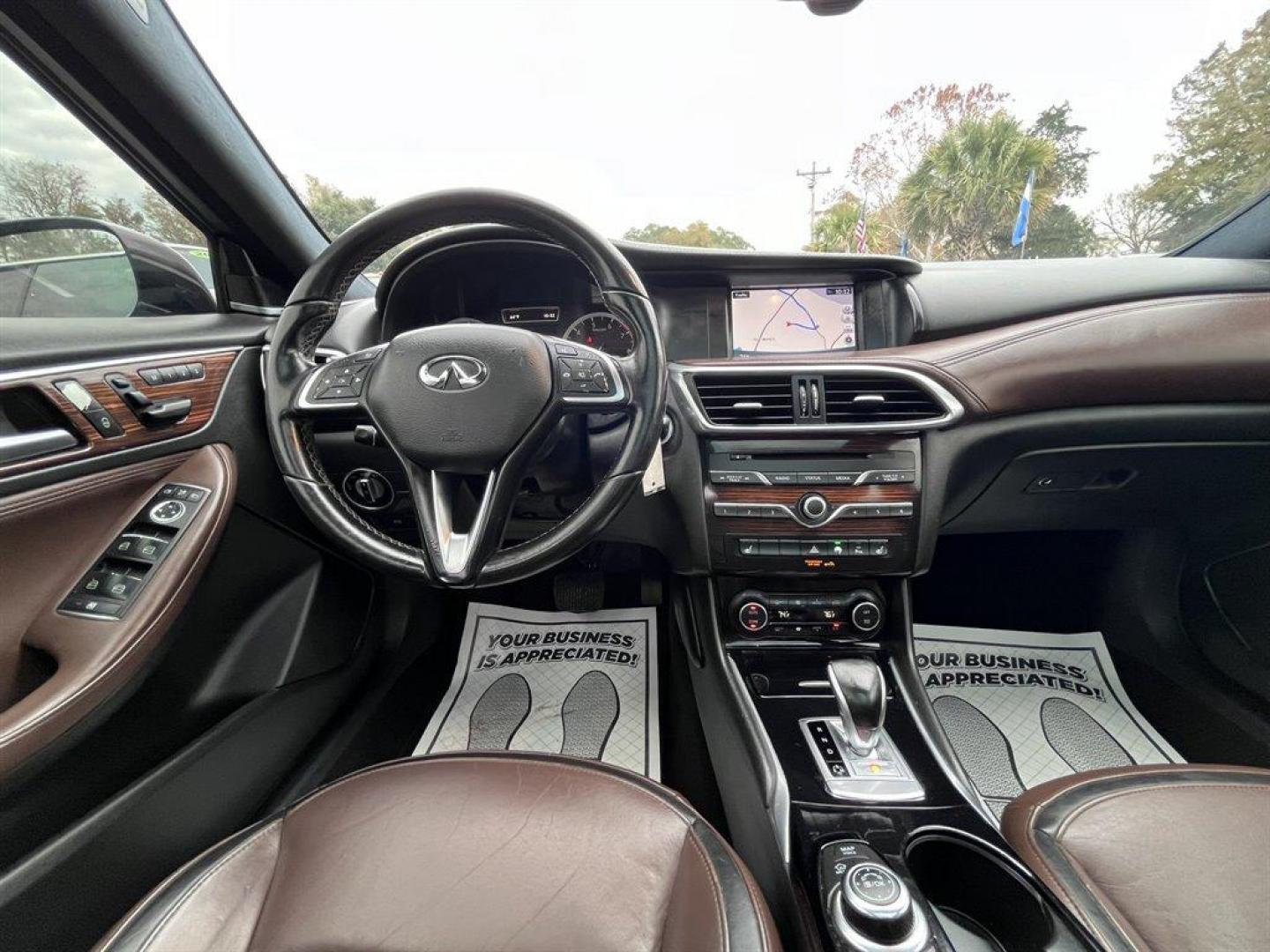 2017 Grey /Brown Infiniti QX30 (SJKCH5CR6HA) with an 2.0l I-4 DI Dohc T/C 2.0l engine, Automatic transmission, located at 745 East Steele Rd., West Columbia, SC, 29170, (803) 755-9148, 33.927212, -81.148483 - Special Internet Price! 2017 Infiniti QX30 with Bluetooth, AM/FM/CD/HD/SAT Audio System, Push Button Start, Remote Keyless Entry, Cruise Control, Dual Zone Front Automatic Air Conditioning, Panoramic Sunroof, Memory Driver Seat Settings, Powered Front Seats, Leather Interior, Rear 60-40 Folding Benc - Photo#4