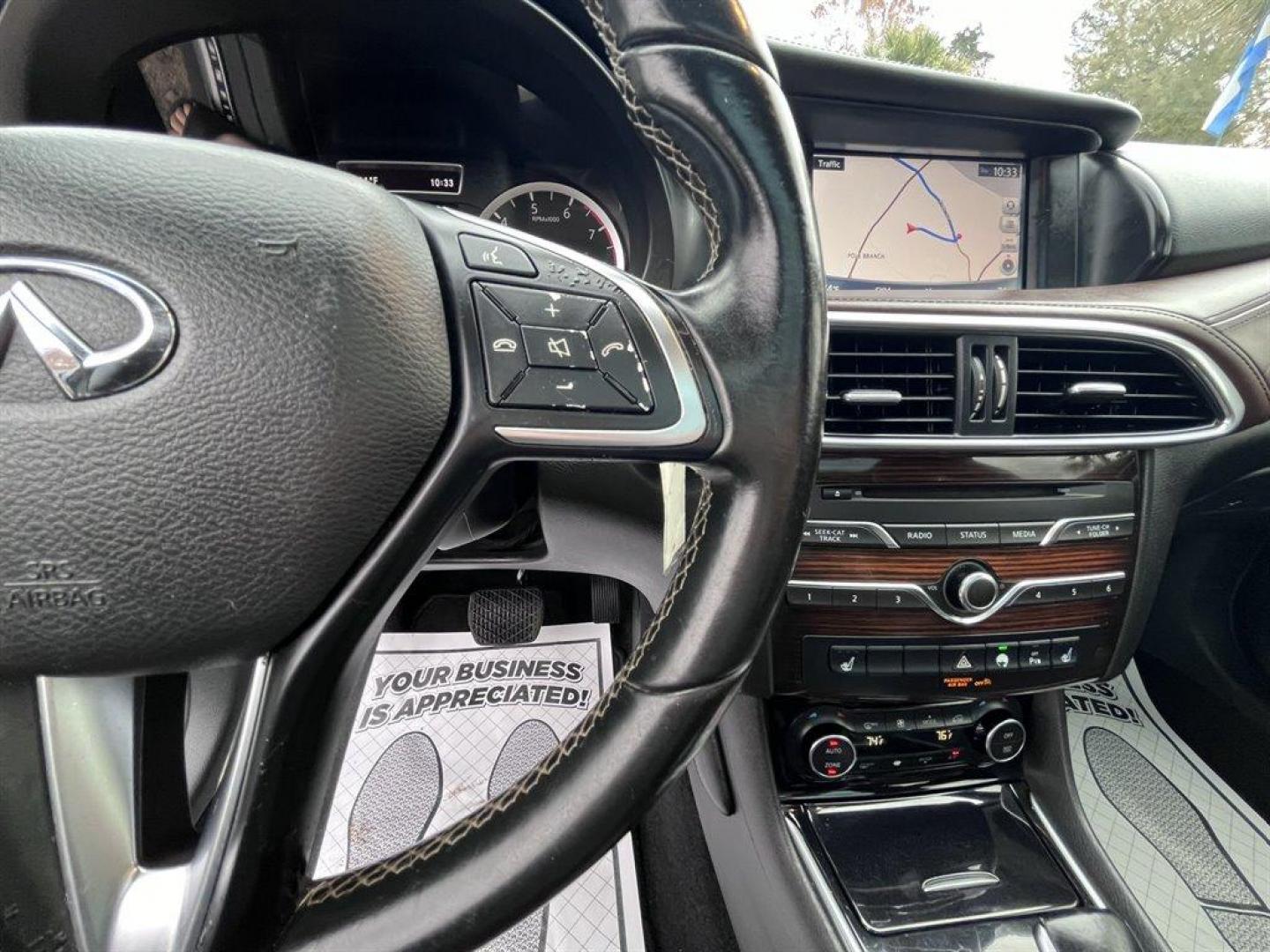 2017 Grey /Brown Infiniti QX30 (SJKCH5CR6HA) with an 2.0l I-4 DI Dohc T/C 2.0l engine, Automatic transmission, located at 745 East Steele Rd., West Columbia, SC, 29170, (803) 755-9148, 33.927212, -81.148483 - Special Internet Price! 2017 Infiniti QX30 with Bluetooth, AM/FM/CD/HD/SAT Audio System, Push Button Start, Remote Keyless Entry, Cruise Control, Dual Zone Front Automatic Air Conditioning, Panoramic Sunroof, Memory Driver Seat Settings, Powered Front Seats, Leather Interior, Rear 60-40 Folding Benc - Photo#8