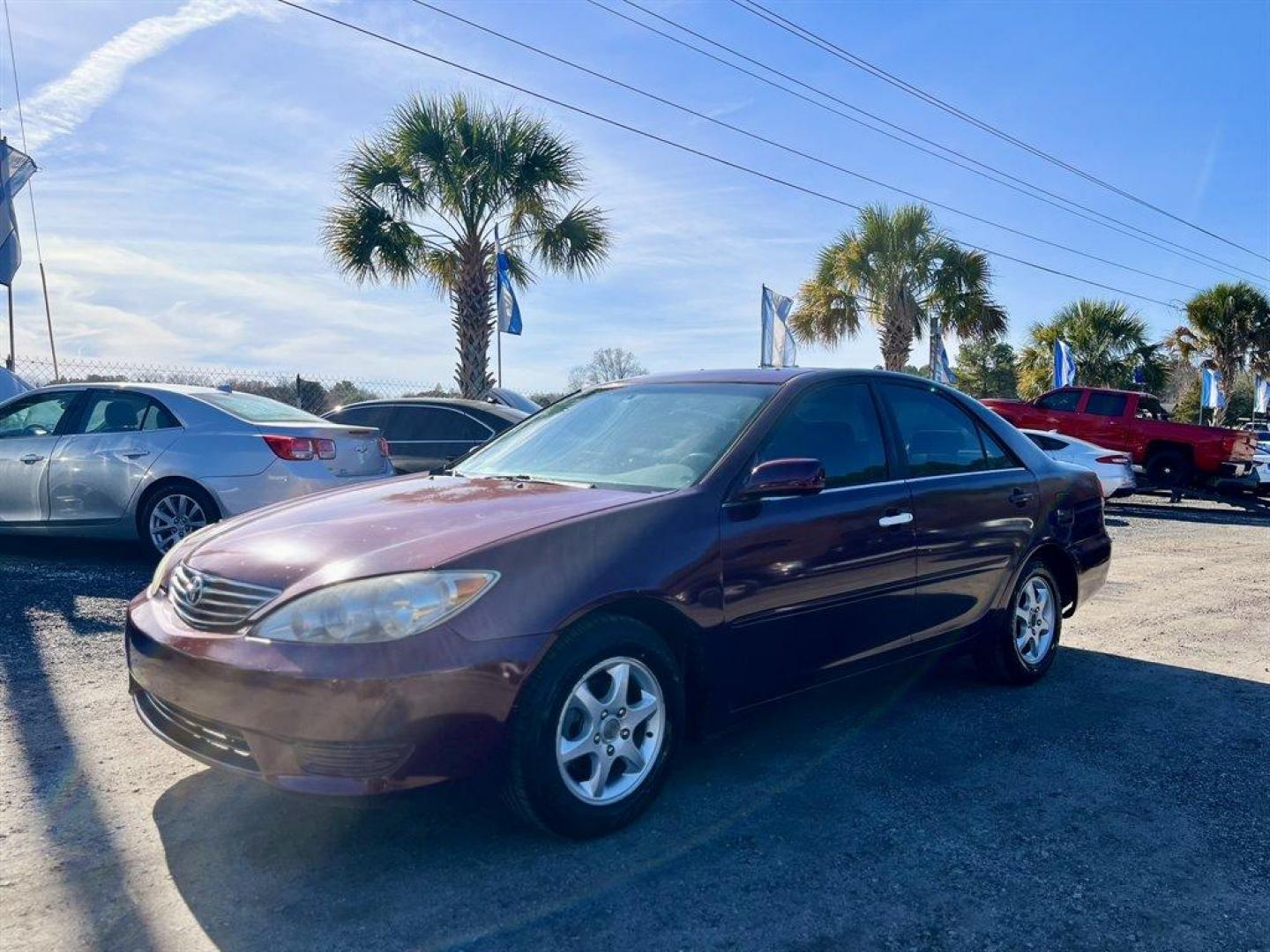 2005 Maroon /Grey Toyota Camry (4T1BE32K55U) with an 2.4l I-4 SFI Dohc 2.4l engine, Automatic transmission, located at 745 East Steele Rd., West Columbia, SC, 29170, (803) 755-9148, 33.927212, -81.148483 - Special Internet Price! 2005 Toyota Camry with AM/FM stereo, CD player, Cruise control, Remote keyless entry, Sunroof, Cloth seat trim, Powered driver seat, Rear 60/40 split fold-down seat, Powered windows, Powered door locks, Plus more! - Photo#0