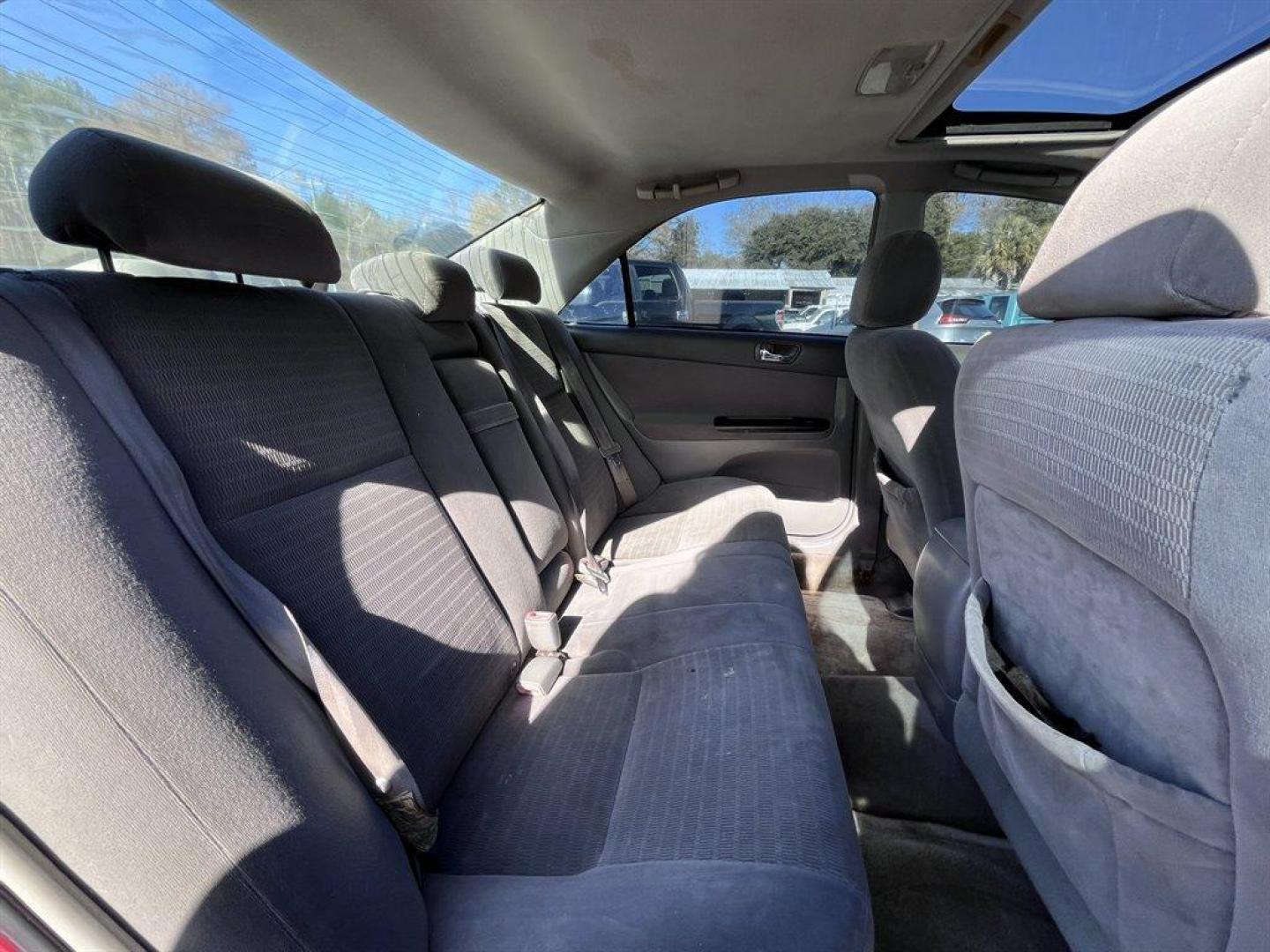 2005 Maroon /Grey Toyota Camry (4T1BE32K55U) with an 2.4l I-4 SFI Dohc 2.4l engine, Automatic transmission, located at 745 East Steele Rd., West Columbia, SC, 29170, (803) 755-9148, 33.927212, -81.148483 - Special Internet Price! 2005 Toyota Camry with AM/FM stereo, CD player, Cruise control, Remote keyless entry, Sunroof, Cloth seat trim, Powered driver seat, Rear 60/40 split fold-down seat, Powered windows, Powered door locks, Plus more! - Photo#17