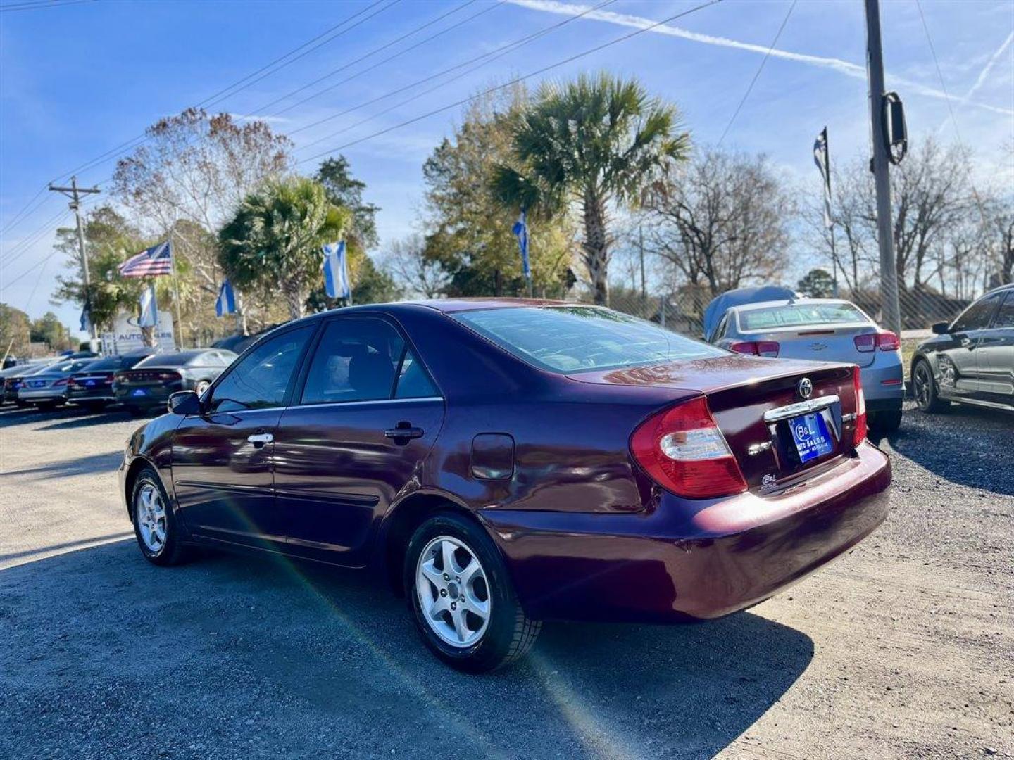 2005 Maroon /Grey Toyota Camry (4T1BE32K55U) with an 2.4l I-4 SFI Dohc 2.4l engine, Automatic transmission, located at 745 East Steele Rd., West Columbia, SC, 29170, (803) 755-9148, 33.927212, -81.148483 - Special Internet Price! 2005 Toyota Camry with AM/FM stereo, CD player, Cruise control, Remote keyless entry, Sunroof, Cloth seat trim, Powered driver seat, Rear 60/40 split fold-down seat, Powered windows, Powered door locks, Plus more! - Photo#1