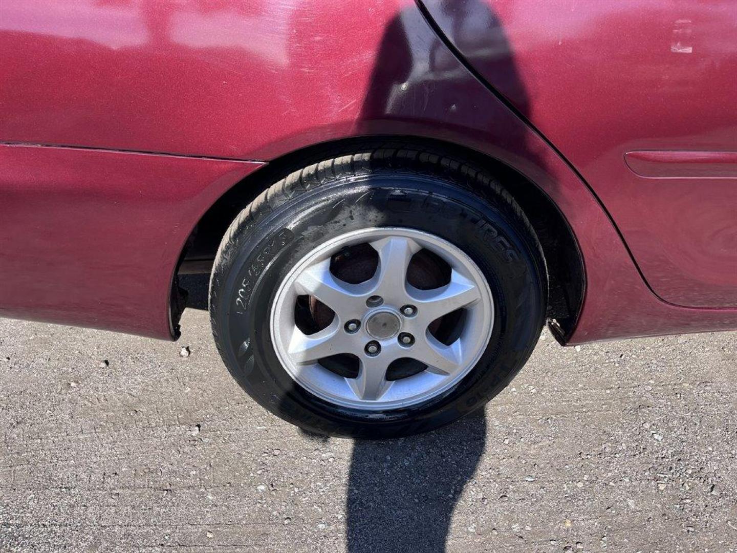 2005 Maroon /Grey Toyota Camry (4T1BE32K55U) with an 2.4l I-4 SFI Dohc 2.4l engine, Automatic transmission, located at 745 East Steele Rd., West Columbia, SC, 29170, (803) 755-9148, 33.927212, -81.148483 - Special Internet Price! 2005 Toyota Camry with AM/FM stereo, CD player, Cruise control, Remote keyless entry, Sunroof, Cloth seat trim, Powered driver seat, Rear 60/40 split fold-down seat, Powered windows, Powered door locks, Plus more! - Photo#24