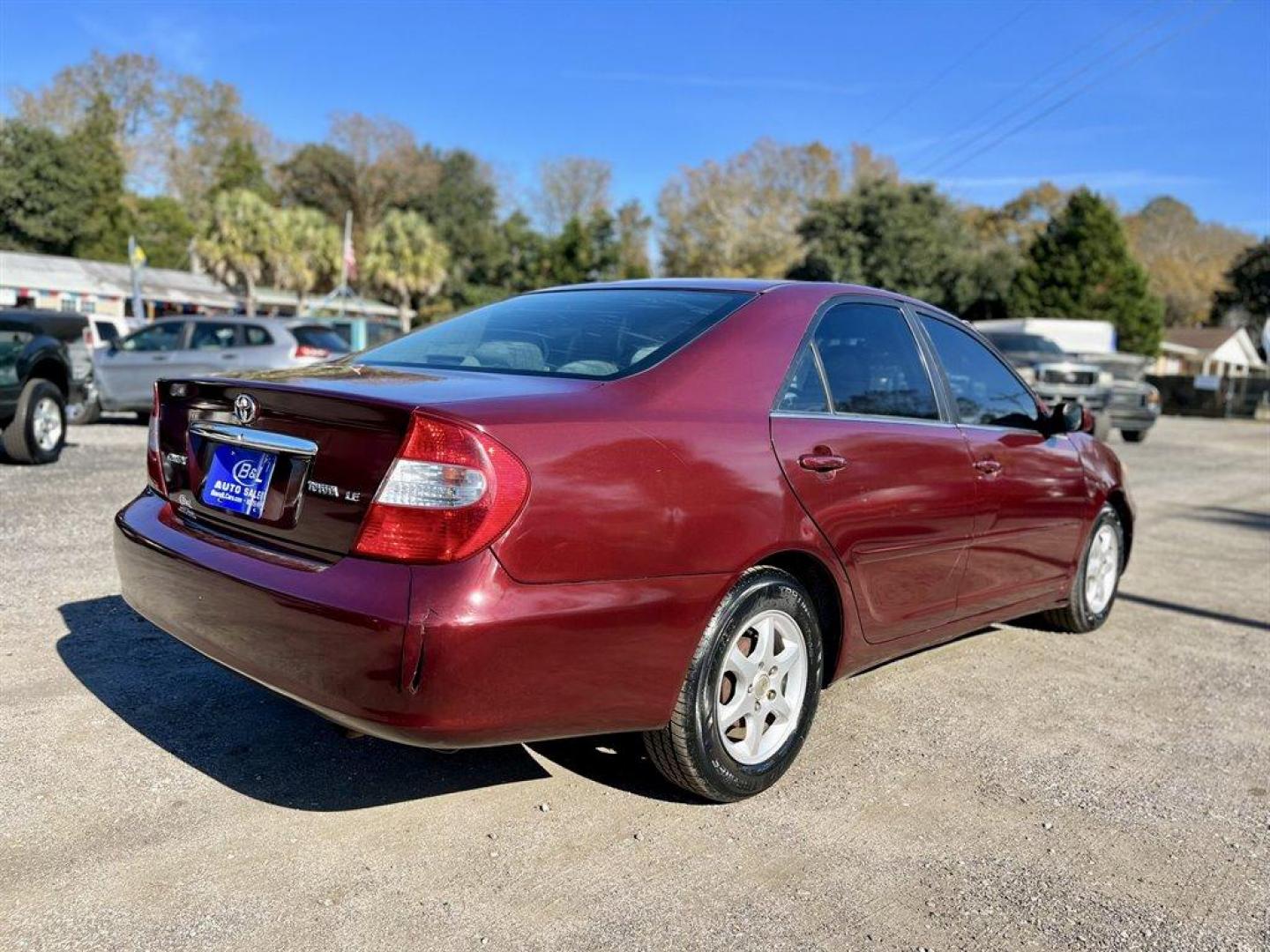 2005 Maroon /Grey Toyota Camry (4T1BE32K55U) with an 2.4l I-4 SFI Dohc 2.4l engine, Automatic transmission, located at 745 East Steele Rd., West Columbia, SC, 29170, (803) 755-9148, 33.927212, -81.148483 - Special Internet Price! 2005 Toyota Camry with AM/FM stereo, CD player, Cruise control, Remote keyless entry, Sunroof, Cloth seat trim, Powered driver seat, Rear 60/40 split fold-down seat, Powered windows, Powered door locks, Plus more! - Photo#2