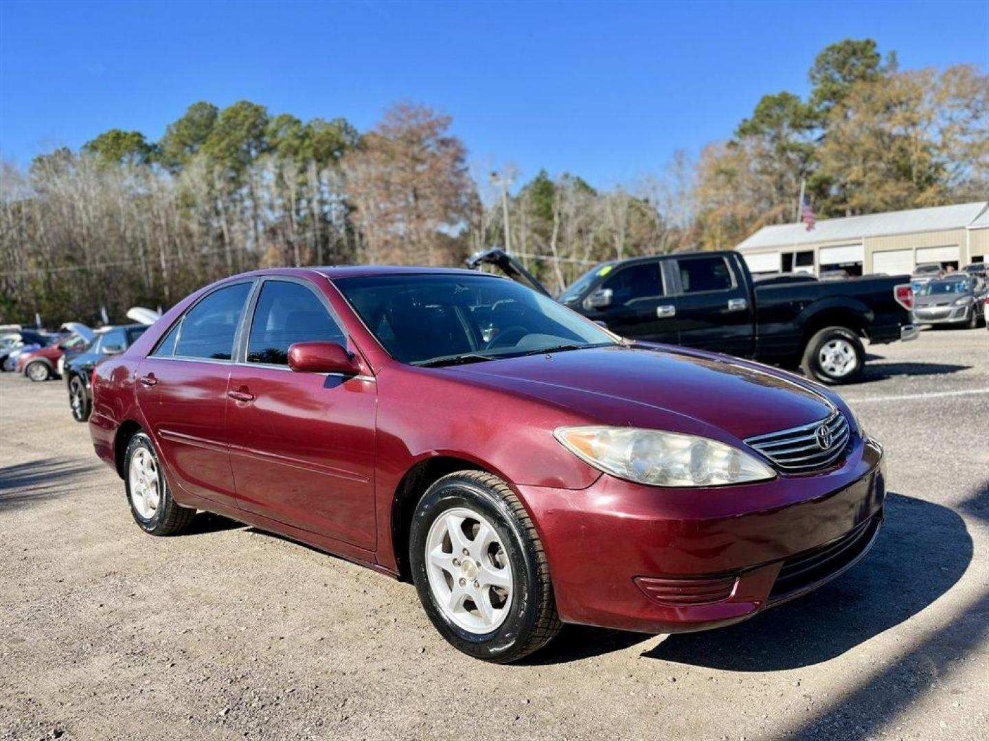 2005 Maroon /Grey Toyota Camry (4T1BE32K55U) with an 2.4l I-4 SFI Dohc 2.4l engine, Automatic transmission, located at 745 East Steele Rd., West Columbia, SC, 29170, (803) 755-9148, 33.927212, -81.148483 - Special Internet Price! 2005 Toyota Camry with AM/FM stereo, CD player, Cruise control, Remote keyless entry, Sunroof, Cloth seat trim, Powered driver seat, Rear 60/40 split fold-down seat, Powered windows, Powered door locks, Plus more! - Photo#3