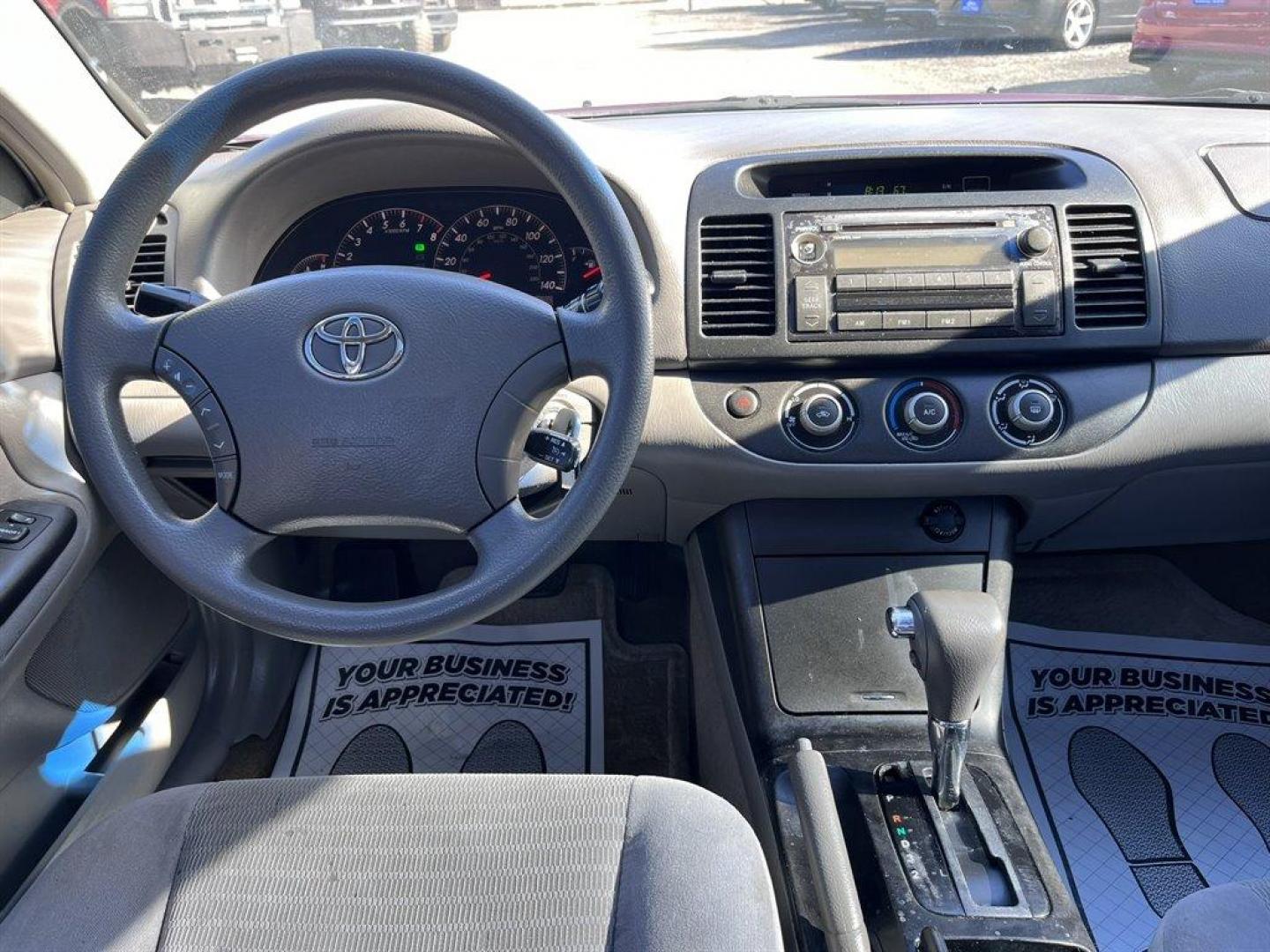 2005 Maroon /Grey Toyota Camry (4T1BE32K55U) with an 2.4l I-4 SFI Dohc 2.4l engine, Automatic transmission, located at 745 East Steele Rd., West Columbia, SC, 29170, (803) 755-9148, 33.927212, -81.148483 - Special Internet Price! 2005 Toyota Camry with AM/FM stereo, CD player, Cruise control, Remote keyless entry, Sunroof, Cloth seat trim, Powered driver seat, Rear 60/40 split fold-down seat, Powered windows, Powered door locks, Plus more! - Photo#4