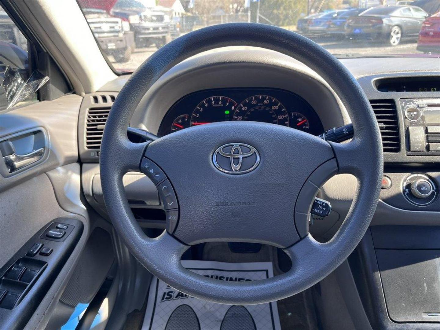 2005 Maroon /Grey Toyota Camry (4T1BE32K55U) with an 2.4l I-4 SFI Dohc 2.4l engine, Automatic transmission, located at 745 East Steele Rd., West Columbia, SC, 29170, (803) 755-9148, 33.927212, -81.148483 - Special Internet Price! 2005 Toyota Camry with AM/FM stereo, CD player, Cruise control, Remote keyless entry, Sunroof, Cloth seat trim, Powered driver seat, Rear 60/40 split fold-down seat, Powered windows, Powered door locks, Plus more! - Photo#5