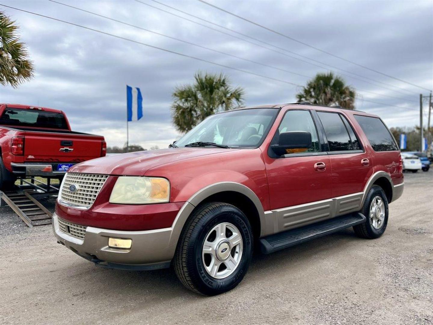 2003 Red /Tan Ford Expedition (1FMPU18L33L) with an 5.4l V8 EFI Sohc 5.4l engine, Automatic transmission, located at 745 East Steele Rd., West Columbia, SC, 29170, (803) 755-9148, 33.927212, -81.148483 - Special Internet Price! 2003 Ford Expedition Eddie Bauer with AM/FM stereo, Cruise control, Keyless entry, Leather front bucket seats, 2nd row captains chairs, Vinyl 3rd row 60/40 split bench seat, Powered windows, Powered door locks, Plus more! - Photo#0