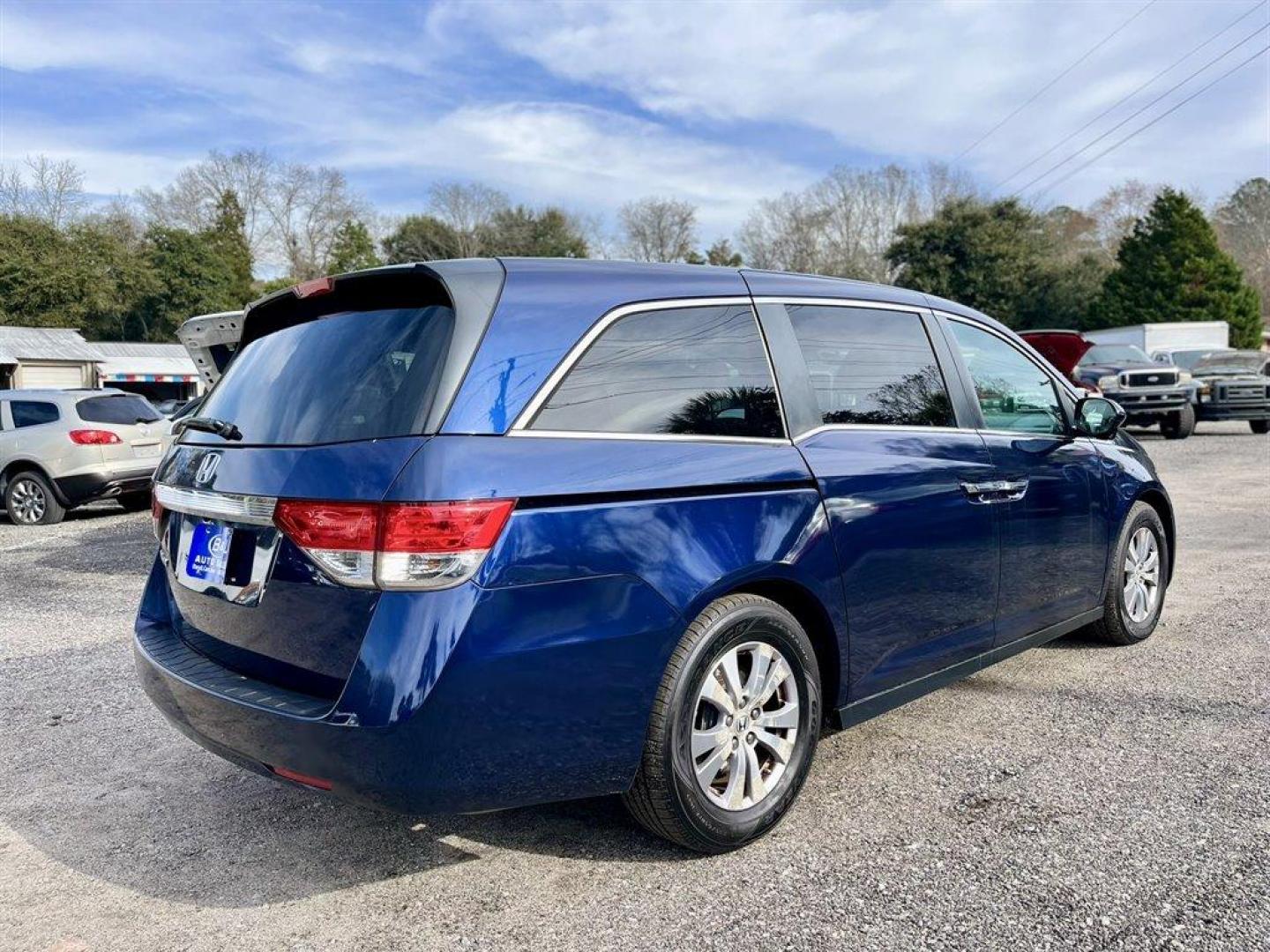 2015 Blue /Grey Honda Odyssey (5FNRL5H60FB) with an 3.5l V6 MPI Sohc Vtec 3.5 engine, Automatic transmission, located at 745 East Steele Rd., West Columbia, SC, 29170, (803) 755-9148, 33.927212, -81.148483 - Special Internet Price! 2015 Honda Odyssey with Bluetooth, AM/FM/CD Audio System, Backup Camera, Cruise Control, Remote Keyless Entry, Dual Zone Front Automatic Air Conditioning, Sunroof, Power Lift Gate, Heated Front Bucket Seats, Removable 40-20-40 Folding Split-Bench, Fixed 60-40 Split-Bench 3rd - Photo#2