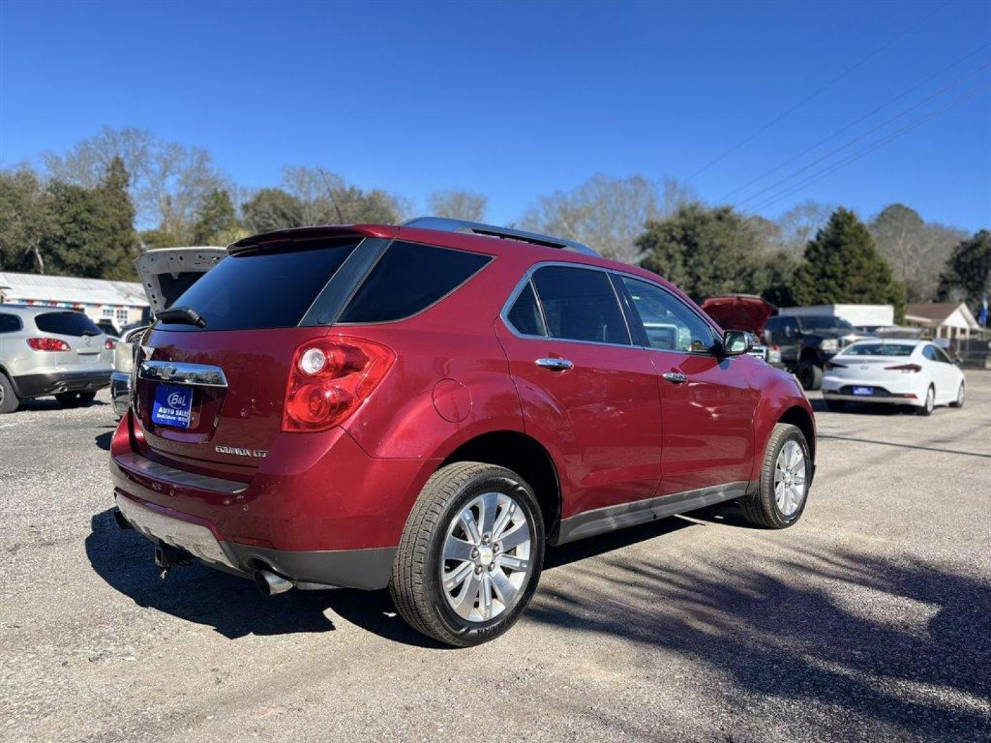 2011 Burgundy /Black Chevrolet Equinox (2CNFLFE53B6) with an 3.0l V6 Sidi Dohc Flex 3. engine, Automatic transmission, located at 745 East Steele Rd., West Columbia, SC, 29170, (803) 755-9148, 33.927212, -81.148483 - Special Internet Price! 2011 Chevrolet Equinox with Bluetooth, AM/FM/XM stereo, Backup camera, Navigation, Sunroof, Cruise control, Air conditioning, Leather interior, Keyless entry, Memory settings for the driver seat, Brake assist, Lane departure, Powered windows, Powered door locks, Plus more! - Photo#2