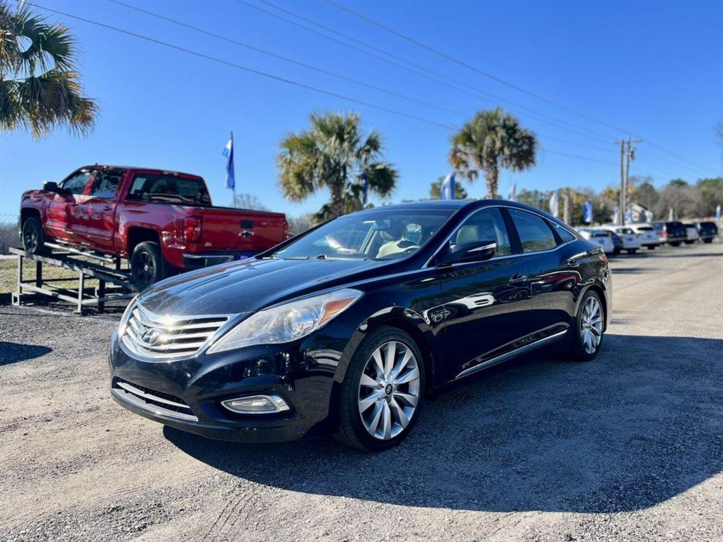 2012 Black /Tan Hyundai Azera (KMHFH4JG3CA) with an 3.3l V6 DI Dohc 3.3l engine, Automatic transmission, located at 745 East Steele Rd., West Columbia, SC, 29170, (803) 755-9148, 33.927212, -81.148483 - Special Internet Price! 2012 Hyundai Azera with Bluetooth, AM/FM/XM, Backup camera, Navigation, Cruise Control, Dual zone automatic climate control, Push button start, Panoramic sunroof, Heated seats in front and back, Powered windows, Powered door locks, Plus more! - Photo#0