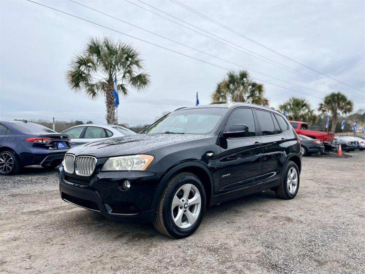 2011 Black /Tan BMW X3 (5UXWX5C5XBL) with an 3.0l I-6 DI Dohc 3.0l engine, Automatic transmission, located at 745 East Steele Rd., West Columbia, SC, 29170, (803) 755-9148, 33.927212, -81.148483 - Special Internet Price! 2011 BMW X3 with AM/FM stereo/CD/MP3 audio system, Bluetooth, HD Radio, Cruise control, Navigation, Satellite view and backup camera, Panoramic sunroof, Keyless entry, Push to start, Automatic climate control, Heated front seats, Leather interior, Powered liftgate, Plus more! - Photo#0