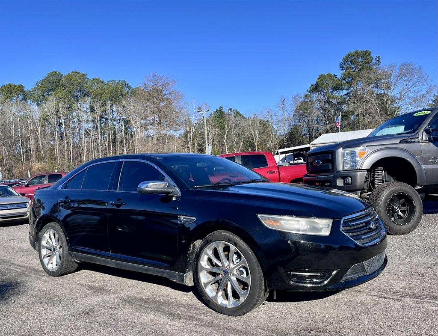 2014 Black /Black Ford Taurus (1FAHP2F87EG) with an 3.5l V6 Smpi TI-VCT 3.5l engine, Automatic transmission, located at 745 East Steele Rd., West Columbia, SC, 29170, (803) 755-9148, 33.927212, -81.148483 - Special Internet Price! 2014 Ford Taurus Limited with AM/FM Stereo/Single CD/MP3 Capable, Remote Keyless Entry, Cruise Control, Sunroof, Heated Seats, Powered Driver Seat, Push To Start, Power Windows, Powered Door Locks, Plus More! - Photo#3