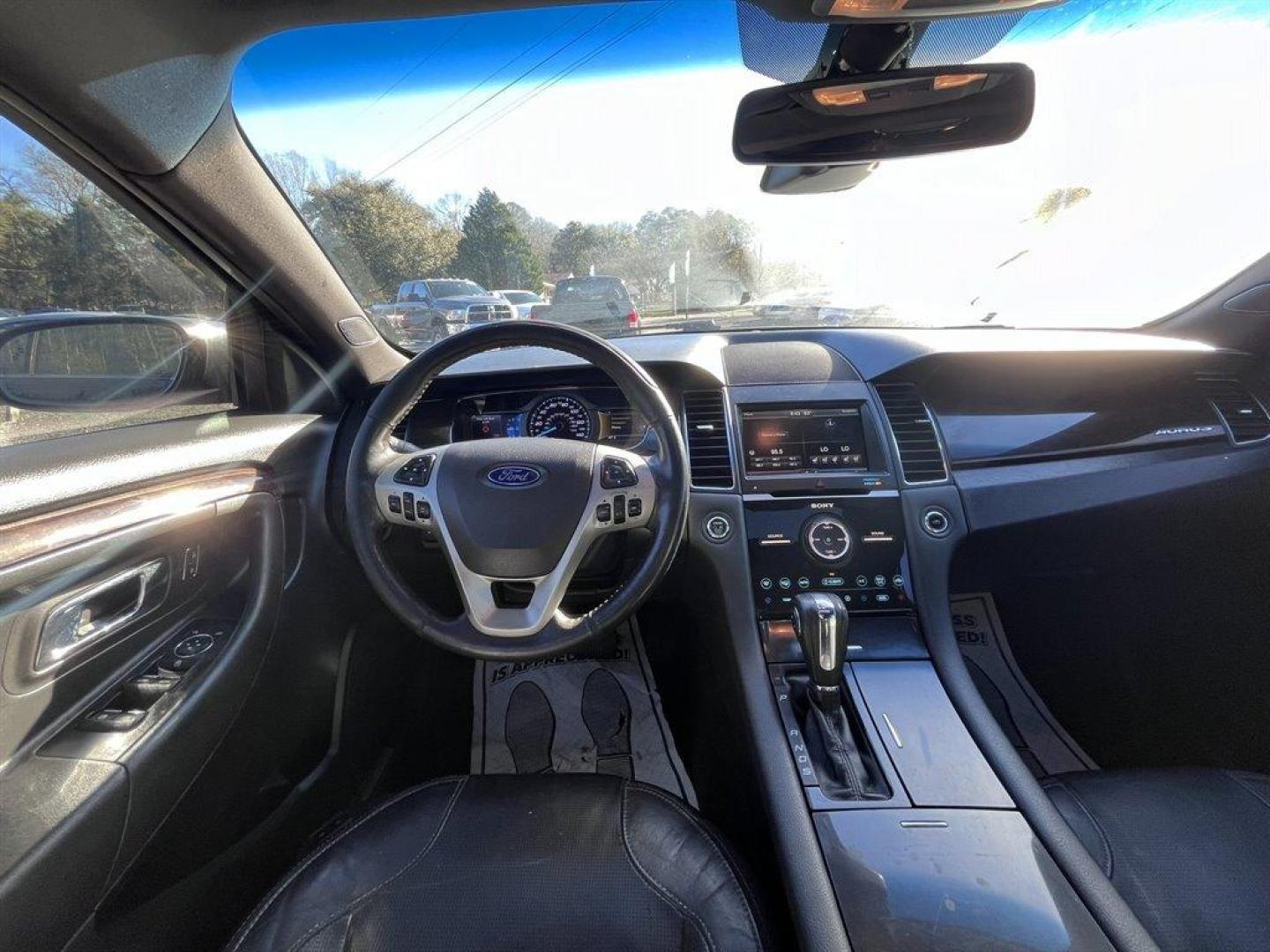 2014 Black /Black Ford Taurus (1FAHP2F87EG) with an 3.5l V6 Smpi TI-VCT 3.5l engine, Automatic transmission, located at 745 East Steele Rd., West Columbia, SC, 29170, (803) 755-9148, 33.927212, -81.148483 - Special Internet Price! 2014 Ford Taurus Limited with AM/FM Stereo/Single CD/MP3 Capable, Remote Keyless Entry, Cruise Control, Sunroof, Heated Seats, Powered Driver Seat, Push To Start, Power Windows, Powered Door Locks, Plus More! - Photo#4