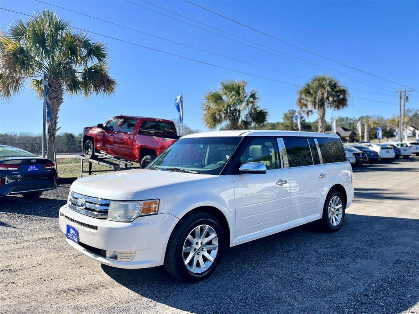 2011 White /Tan Ford Flex (2FMGK5CC6BB) with an 3.5l V6 SFI Dohc 24v 3.5l engine, Automatic transmission, located at 745 East Steele Rd., West Columbia, SC, 29170, (803) 755-9148, 33.927212, -81.148483 - Special Internet Price! 2011 Ford Flex SEL AM/FM stereo, Cruise control, Dual-zone air conditioning, Heated front leather bucket seats, 2nd row captain seats, Built in headrest DVD players, 3rd row bench seat, Powered liftgate, Sunroof, Powered windows, Powered door locks, Plus more! - Photo#0