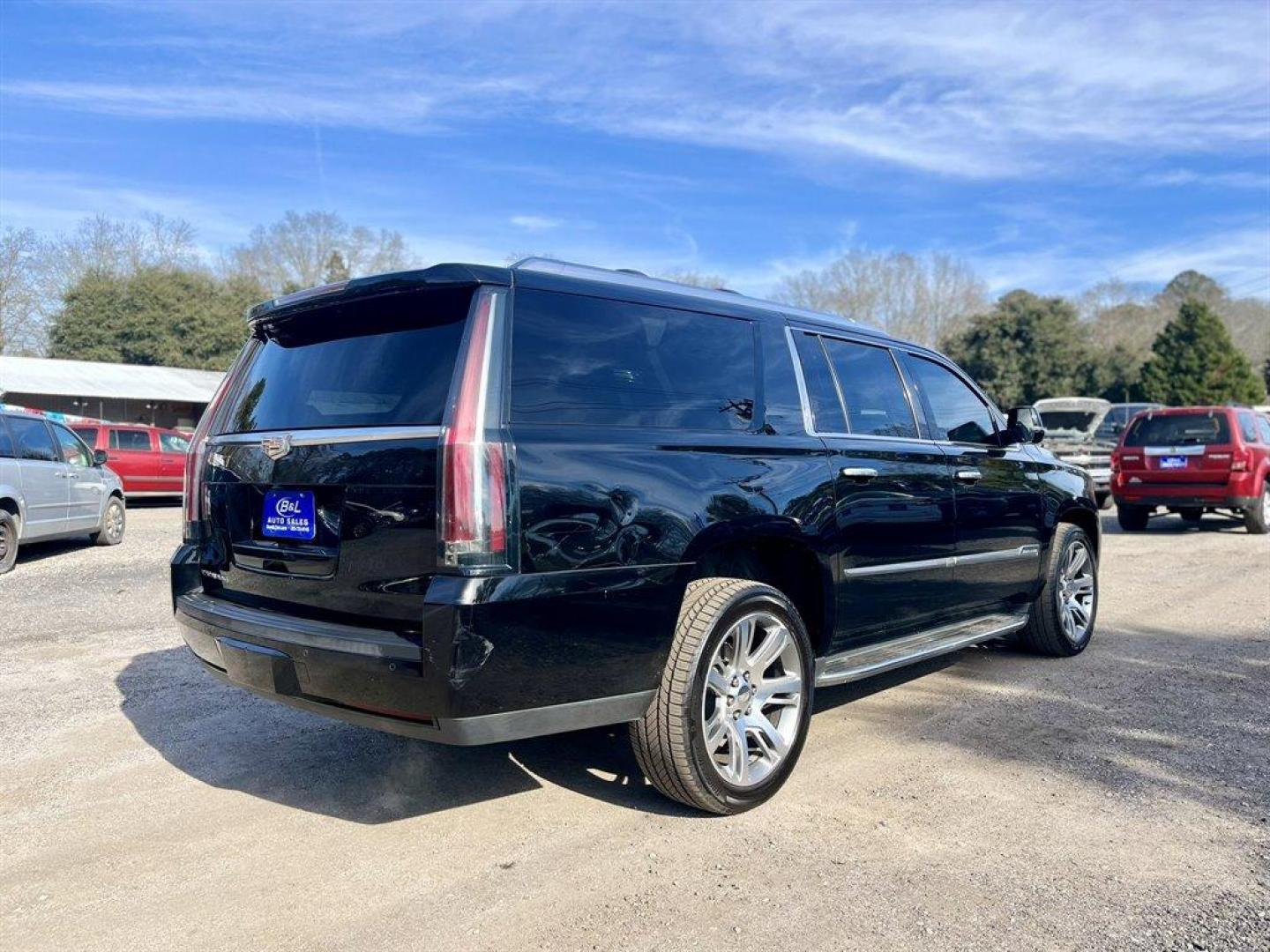 2016 Black /Black Cadillac Escalade (1GYS4HKJ3GR) with an 6.2l V8 DI VVT Flex 6.2l engine, Automatic transmission, located at 745 East Steele Rd., West Columbia, SC, 29170, (803) 755-9148, 33.927212, -81.148483 - Special Internet Price! 2016 Cadillac Escalade ESV Luxury with Bluetooth, 3-month All Access trial subscription SiriusXM Satellite Radio, Backup camera, Navigation, Cruise control, Head-Up display, Push to start, Keyless entry, Sunroof, Dual rear entertainment, Black leather interior, Driver memory - Photo#2