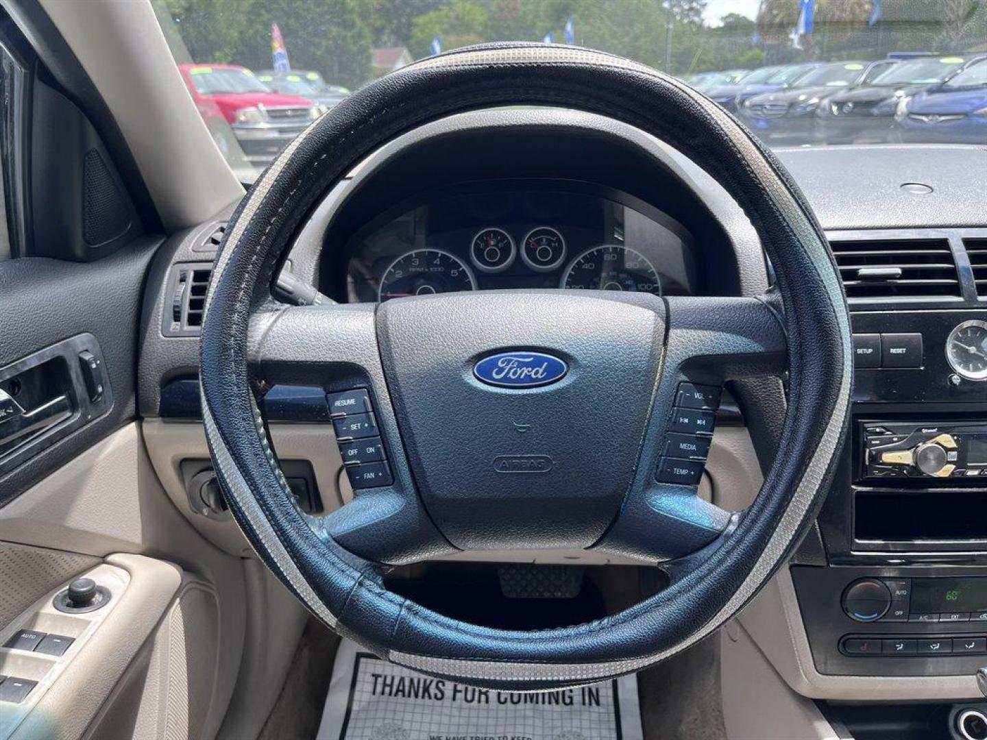 2006 White /Tan Ford Fusion (3FAFP08166R) with an 3.0l V6 EFI 3.0l engine, Automatic transmission, located at 745 East Steele Rd., West Columbia, SC, 29170, (803) 755-9148, 33.927212, -81.148483 - Special Internet Price! 2006 Ford Fusion - Photo#5