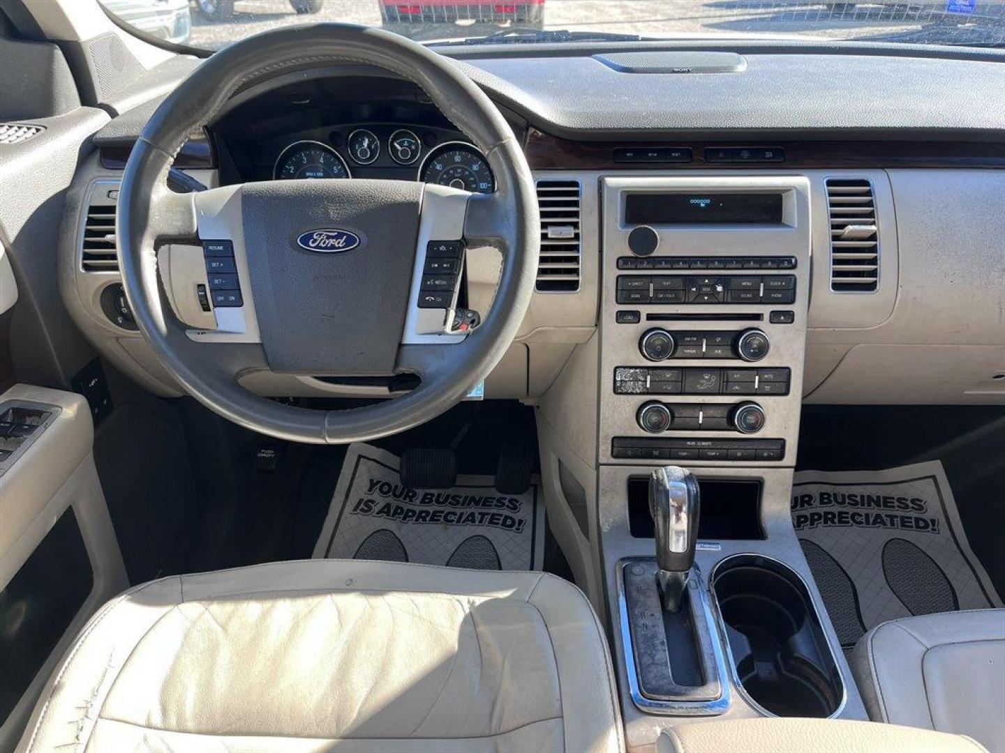 2011 White /Tan Ford Flex (2FMGK5CC6BB) with an 3.5l V6 SFI Dohc 24v 3.5l engine, Automatic transmission, located at 745 East Steele Rd., West Columbia, SC, 29170, (803) 755-9148, 33.927212, -81.148483 - Special Internet Price! 2011 Ford Flex SEL AM/FM stereo, Cruise control, Dual-zone air conditioning, Heated front leather bucket seats, 2nd row captain seats, Built in headrest DVD players, 3rd row bench seat, Powered liftgate, Sunroof, Powered windows, Powered door locks, Plus more! - Photo#4