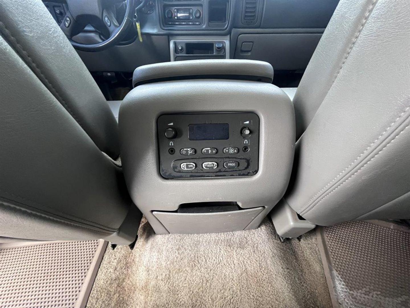 2003 White /Grey GMC Yukon (1GKEK13Z03J) with an 5.3l V8 SFI Flex 5.3l engine, Automatic transmission, located at 745 East Steele Rd., West Columbia, SC, 29170, (803) 755-9148, 33.927212, -81.148483 - Special Internet Price! 2003 GMC Yukon with AM/FM stereo, Cruise control, Sunroof, Air conditioning, Keyless entry, 3rd row seating, Leather interior, Powered windows, Powered door locks, Plus more! - Photo#21