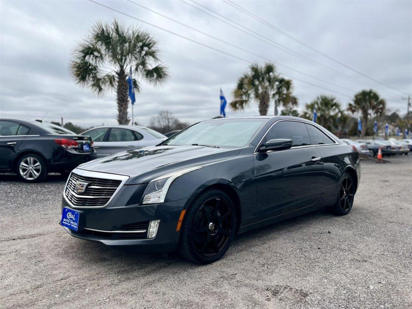 2015 Grey /Black Cadillac ATS (1G6AJ1RX4F0) with an 2.0l I-4 DI Dohc T/C 2.0l engine, Automatic transmission, located at 745 East Steele Rd., West Columbia, SC, 29170, (803) 755-9148, 33.927212, -81.148483 - Special Internet Price! 2015 Cadillac ATS with Bluetooth, Backup camera, Navigation, Cruise control, Remote Keyless Entry, Sunroof, Leather interior, Powered windows, Powered door locks, Plus more! - Photo#0