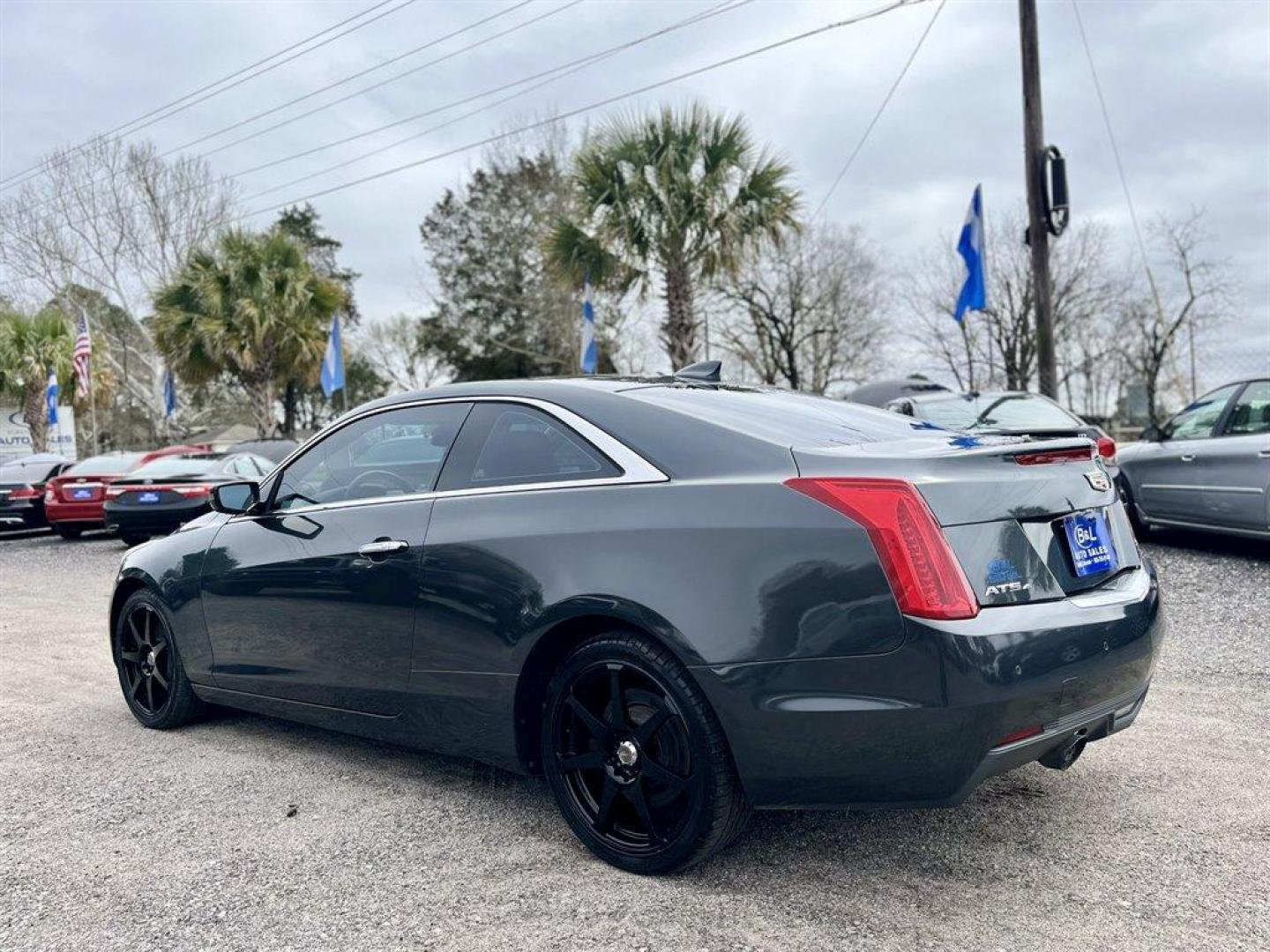 2015 Grey /Black Cadillac ATS (1G6AJ1RX4F0) with an 2.0l I-4 DI Dohc T/C 2.0l engine, Automatic transmission, located at 745 East Steele Rd., West Columbia, SC, 29170, (803) 755-9148, 33.927212, -81.148483 - Special Internet Price! 2015 Cadillac ATS with Bluetooth, Backup camera, Navigation, Cruise control, Remote Keyless Entry, Sunroof, Leather interior, Powered windows, Powered door locks, Plus more! - Photo#1