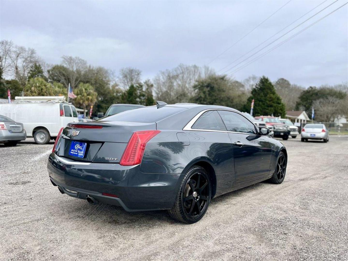 2015 Grey /Black Cadillac ATS (1G6AJ1RX4F0) with an 2.0l I-4 DI Dohc T/C 2.0l engine, Automatic transmission, located at 745 East Steele Rd., West Columbia, SC, 29170, (803) 755-9148, 33.927212, -81.148483 - Special Internet Price! 2015 Cadillac ATS with Bluetooth, Backup camera, Navigation, Cruise control, Remote Keyless Entry, Sunroof, Leather interior, Powered windows, Powered door locks, Plus more! - Photo#2