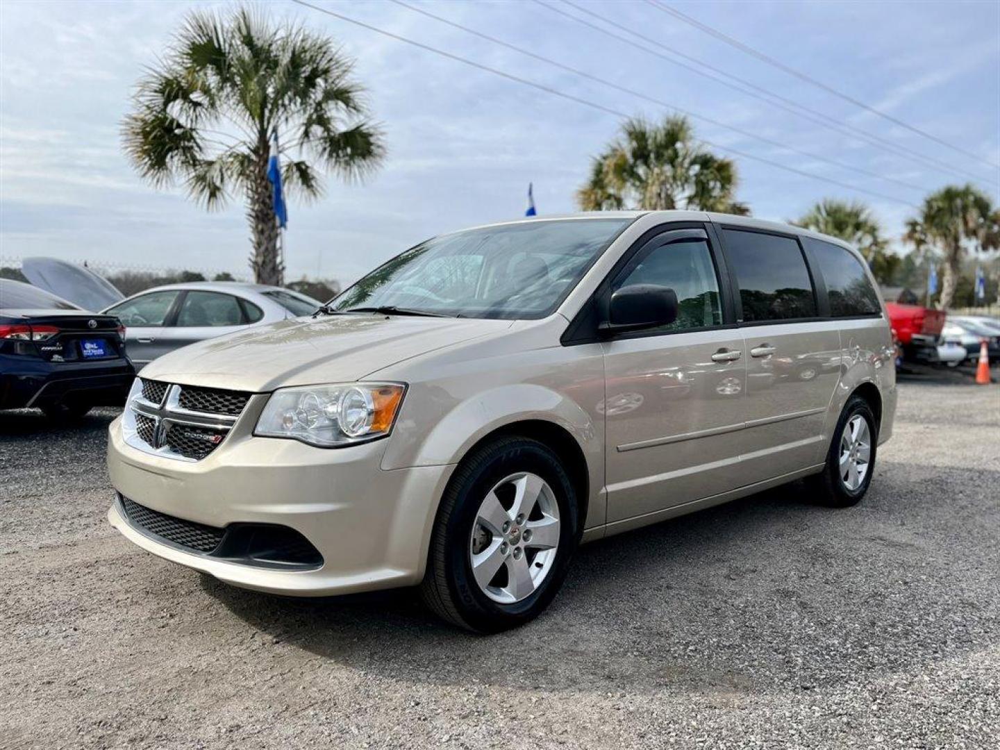 2013 Beige /Grey Dodge Grand Caravan (2C4RDGBG1DR) with an 3.6l V6 MPI Dohc VVT Flex engine, Automatic transmission, located at 745 East Steele Rd., West Columbia, SC, 29170, (803) 755-9148, 33.927212, -81.148483 - Special Internet Price! 2013 Dodge Grand Caravan with AM/FM stereo, Air conditioning, Cruise control, Keyless entry, Cloth interior, 2nd row fold-in-floor bucket seats, 3rd row Stow 'N Go with tailgate seats, Powered windows, Powered door locks, Plus more! - Photo#0