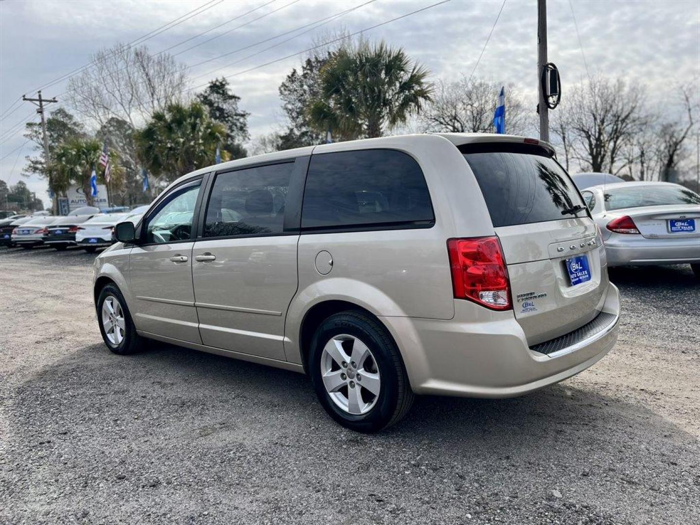 2013 Beige /Grey Dodge Grand Caravan (2C4RDGBG1DR) with an 3.6l V6 MPI Dohc VVT Flex engine, Automatic transmission, located at 745 East Steele Rd., West Columbia, SC, 29170, (803) 755-9148, 33.927212, -81.148483 - Special Internet Price! 2013 Dodge Grand Caravan with AM/FM stereo, Air conditioning, Cruise control, Keyless entry, Cloth interior, 2nd row fold-in-floor bucket seats, 3rd row Stow 'N Go with tailgate seats, Powered windows, Powered door locks, Plus more! - Photo#1